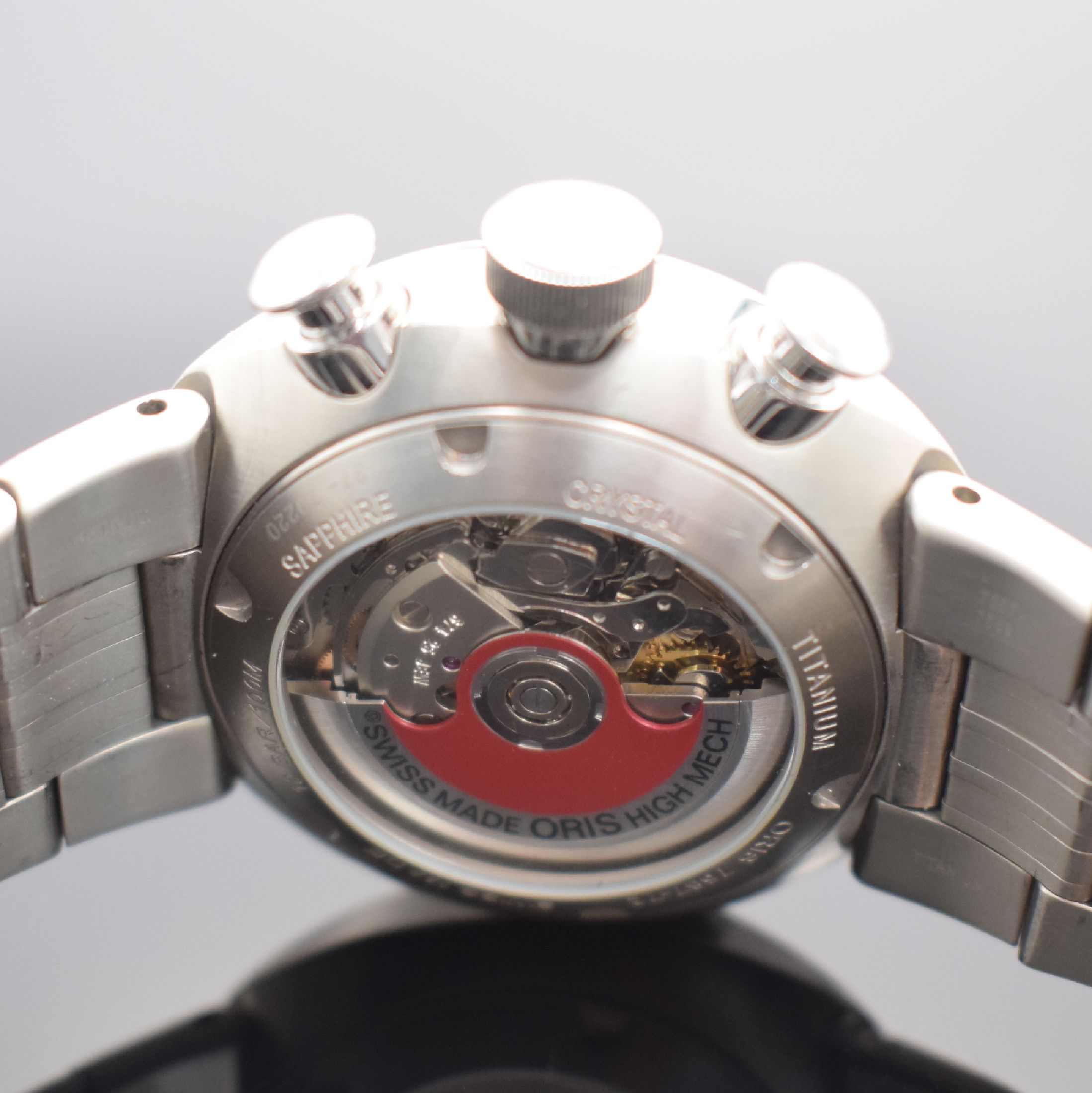 Detail d: ORIS TT3 Herrenarmbanduhr mit Chronograph, Schweiz um 2010, Automatik, beids. vergl. Titangeh., Boden & Krone verschr., orig. Titan Gliederband, ...