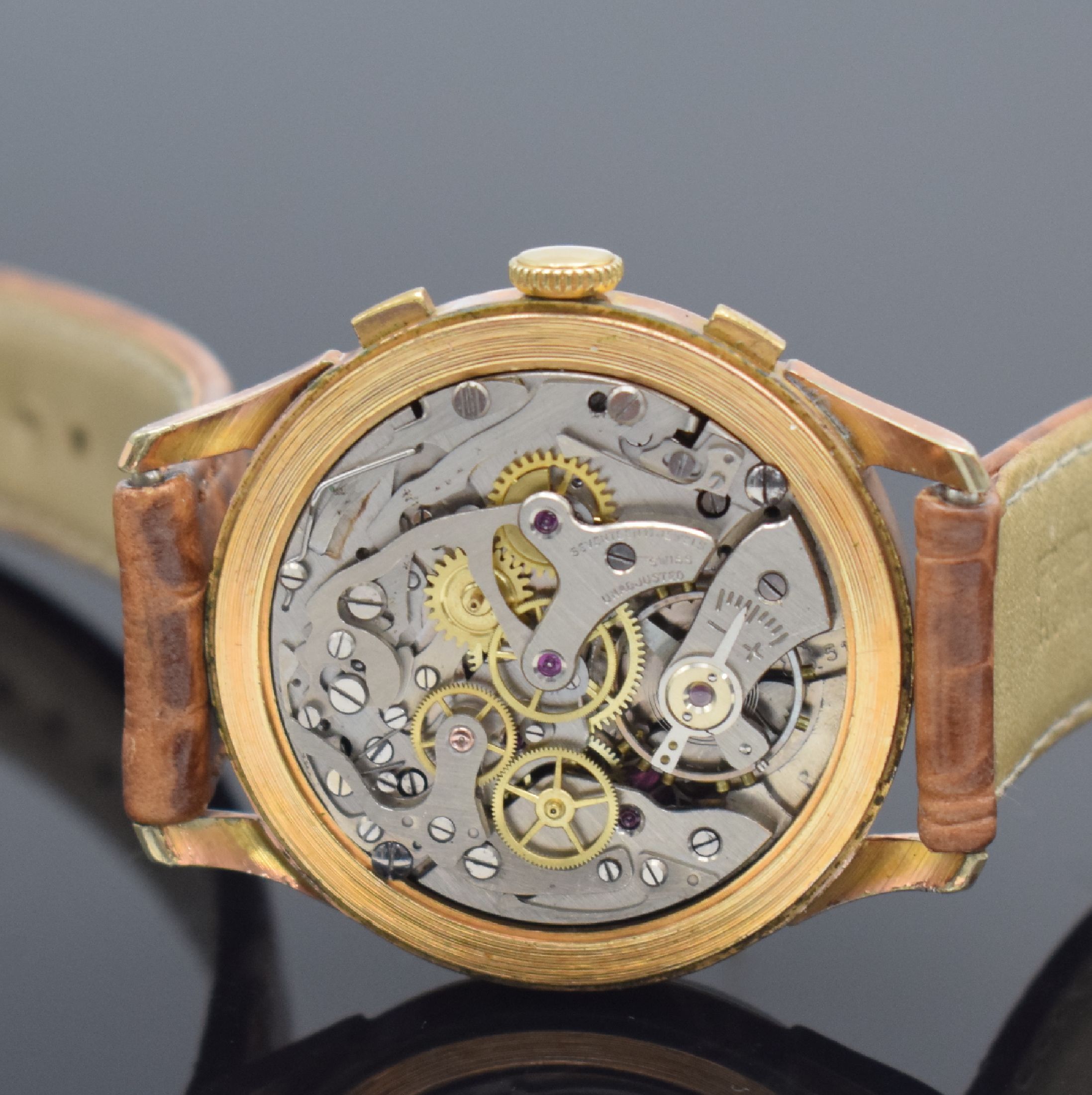 Detail d: ITA Geneve Armbandchronograph, Schweiz um 1945, Handaufzug, verg. Geh., Edelstahlboden aufgedr., silb. Zifferbl. m. arab. Zahlen & Indizes, gold. ...