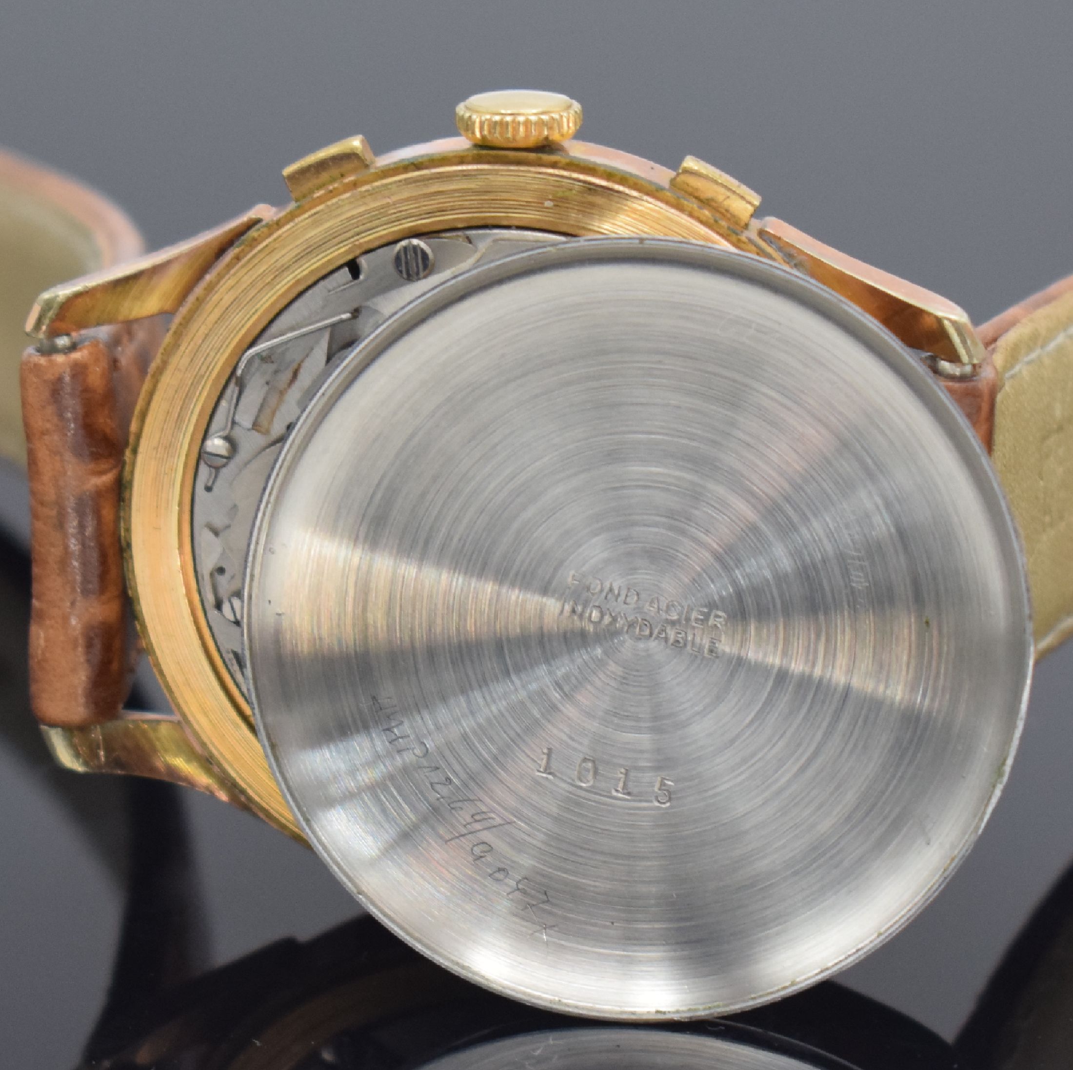 Detail e: ITA Geneve Armbandchronograph, Schweiz um 1945, Handaufzug, verg. Geh., Edelstahlboden aufgedr., silb. Zifferbl. m. arab. Zahlen & Indizes, gold. ...