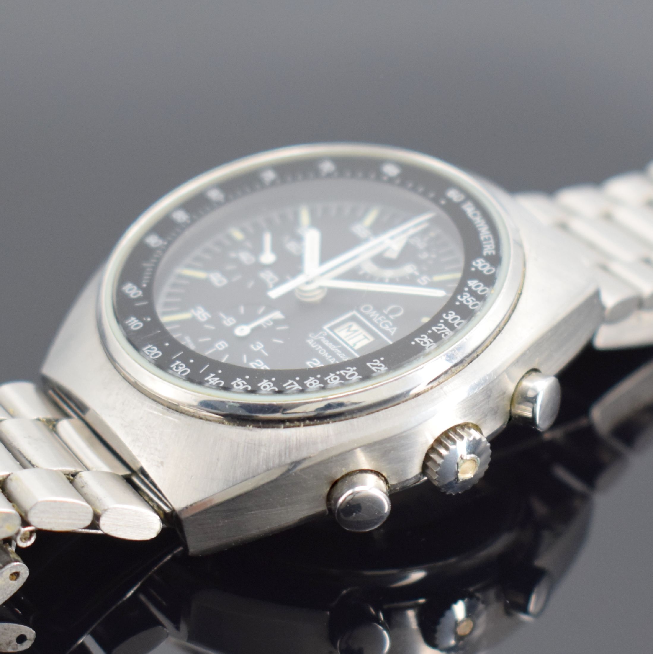 Detail c: OMEGA Speedmaster Armbandchronograph mit original Garantie-Booklet Referenz 176.0012, Automatik, Stahlgeh. inkl. orig. Gliederband m. Faltschließe, ...