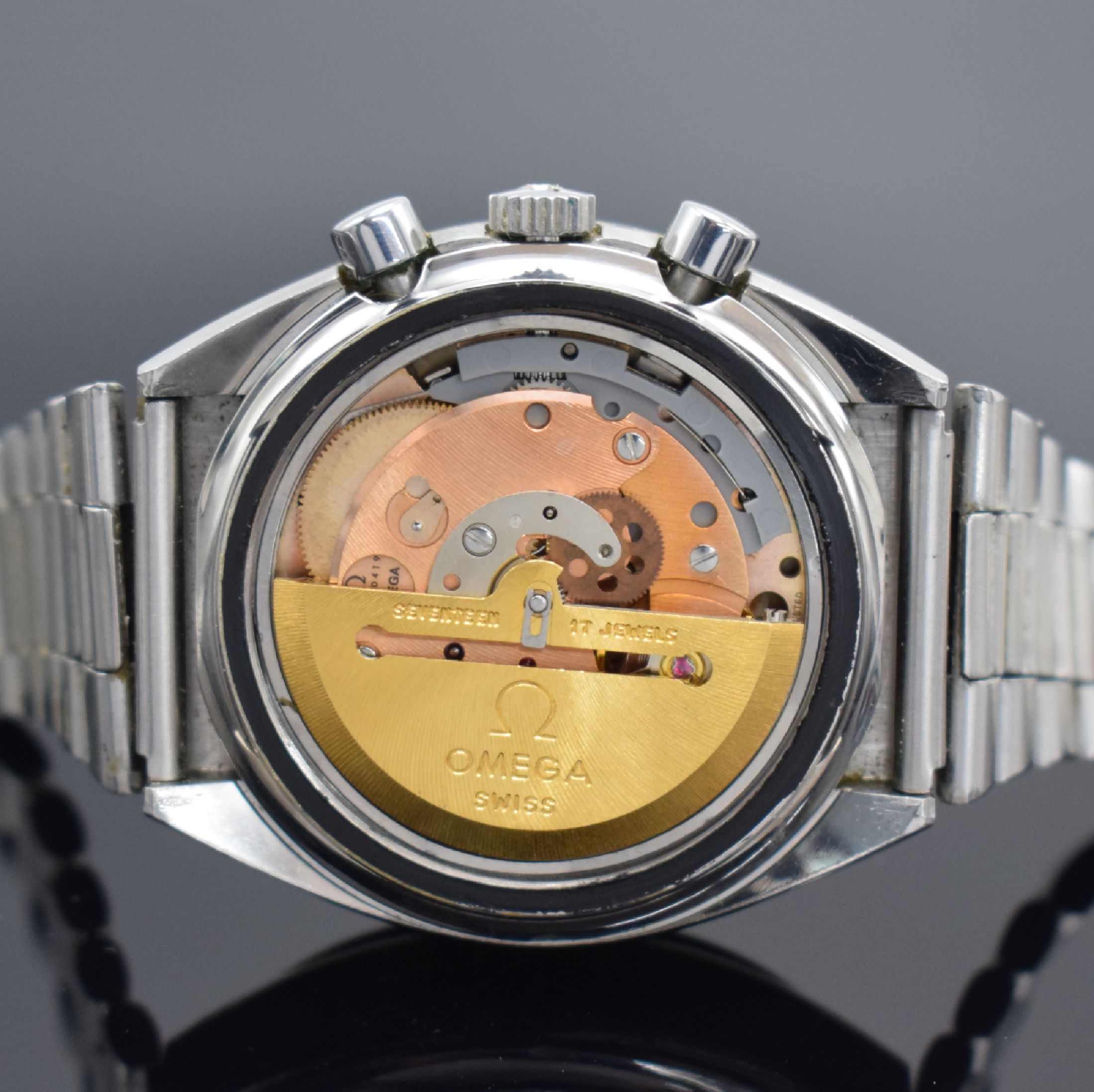 Detail e: OMEGA Speedmaster Armbandchronograph mit original Garantie-Booklet Referenz 176.0012, Automatik, Stahlgeh. inkl. orig. Gliederband m. Faltschließe, ...