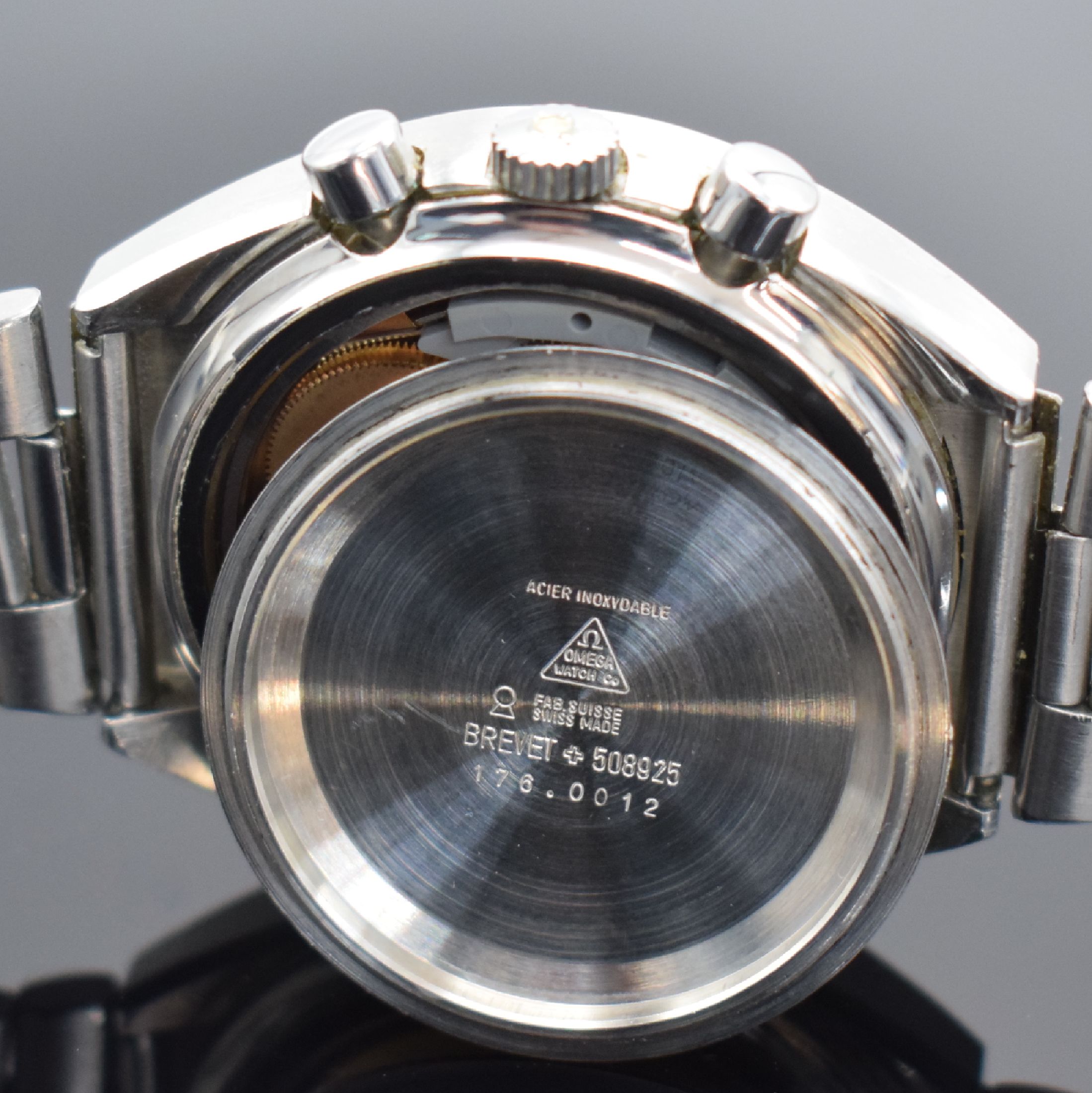 Detail g: OMEGA Speedmaster Armbandchronograph mit original Garantie-Booklet Referenz 176.0012, Automatik, Stahlgeh. inkl. orig. Gliederband m. Faltschließe, ...
