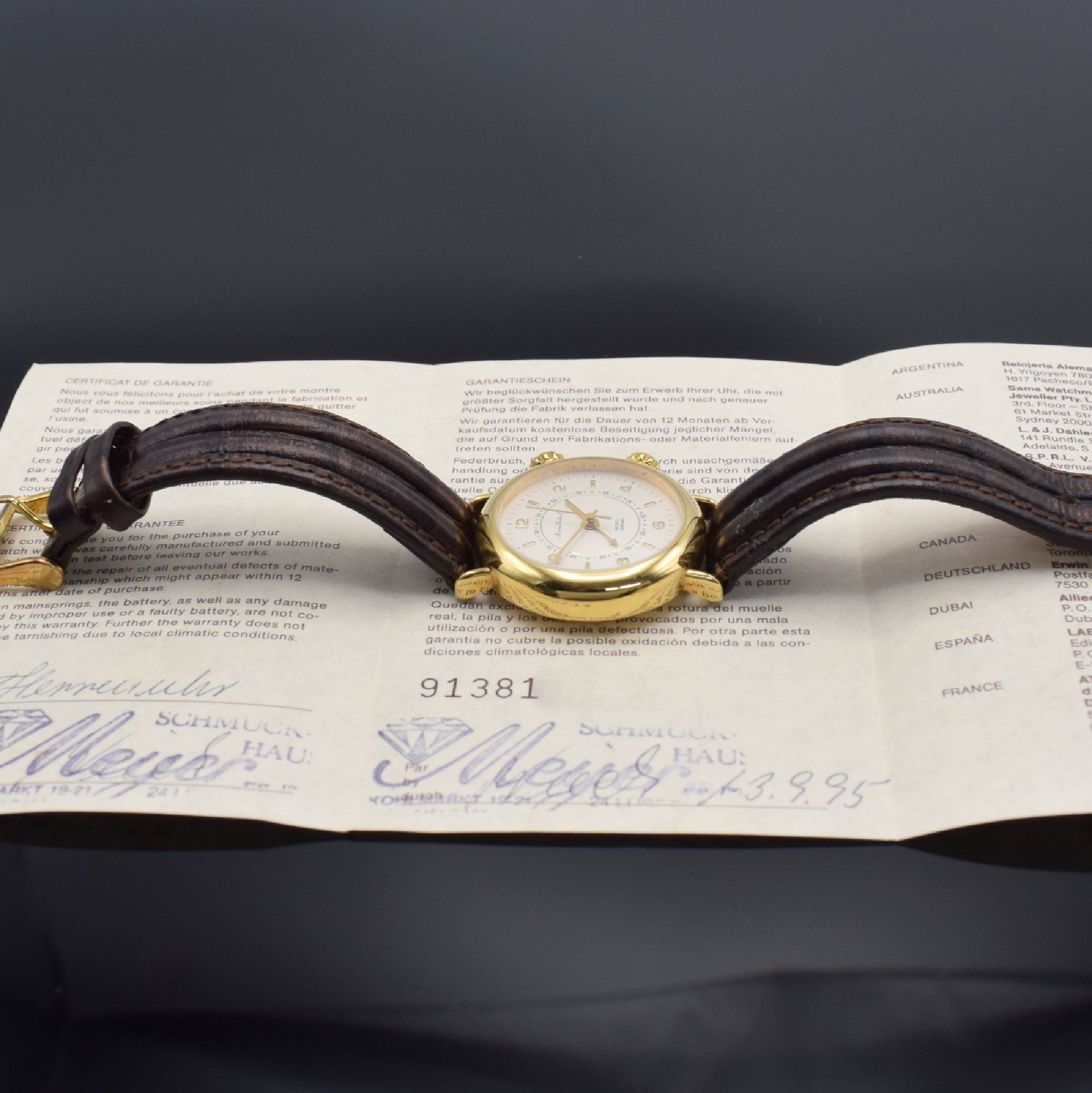 Detail d: EMKA Herrenarmbanduhr mit Wecker, Schweiz verk. lt. beil. Zertifikat 09/1995, Handaufzug, beids. vergl., verg. Gehäuse, silb. Zifferbl. m. aufges. ...