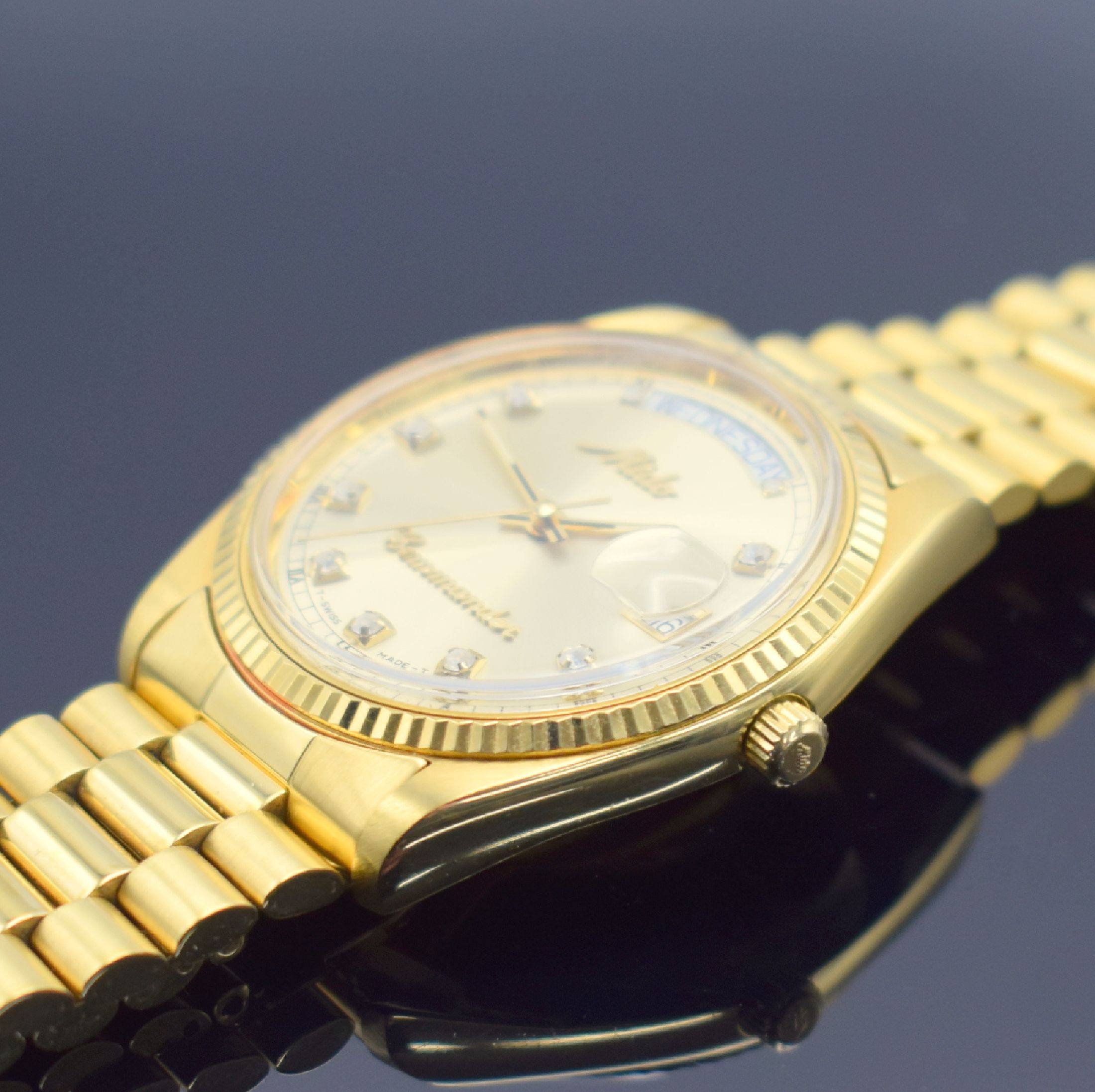 Detail c: MIDO Commander Herrenarmbanduhr, Schweiz um 1990, Automatik, Ref. 8299, verg. Monocoque- Geh., verschr. Krone, orig. Gliederband m. Faltschl., gold. ...