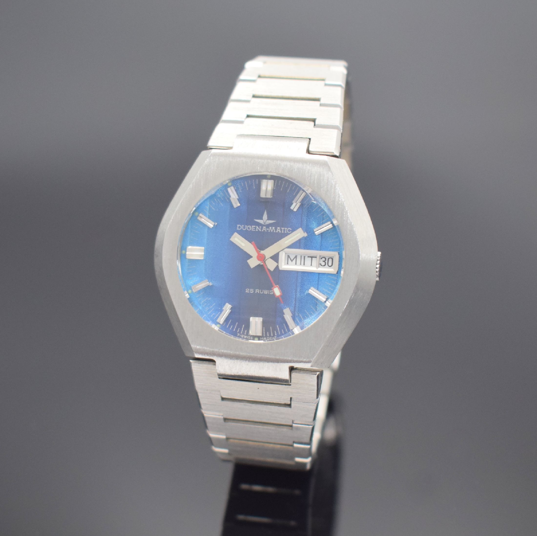 DUGENA-MATIC seltene Armbanduhr mit Fume Zifferblatt, Schweiz um 1970, Automatik, Edelstahlgeh., Boden geschr., Gliederband. m. Faltschl., ...