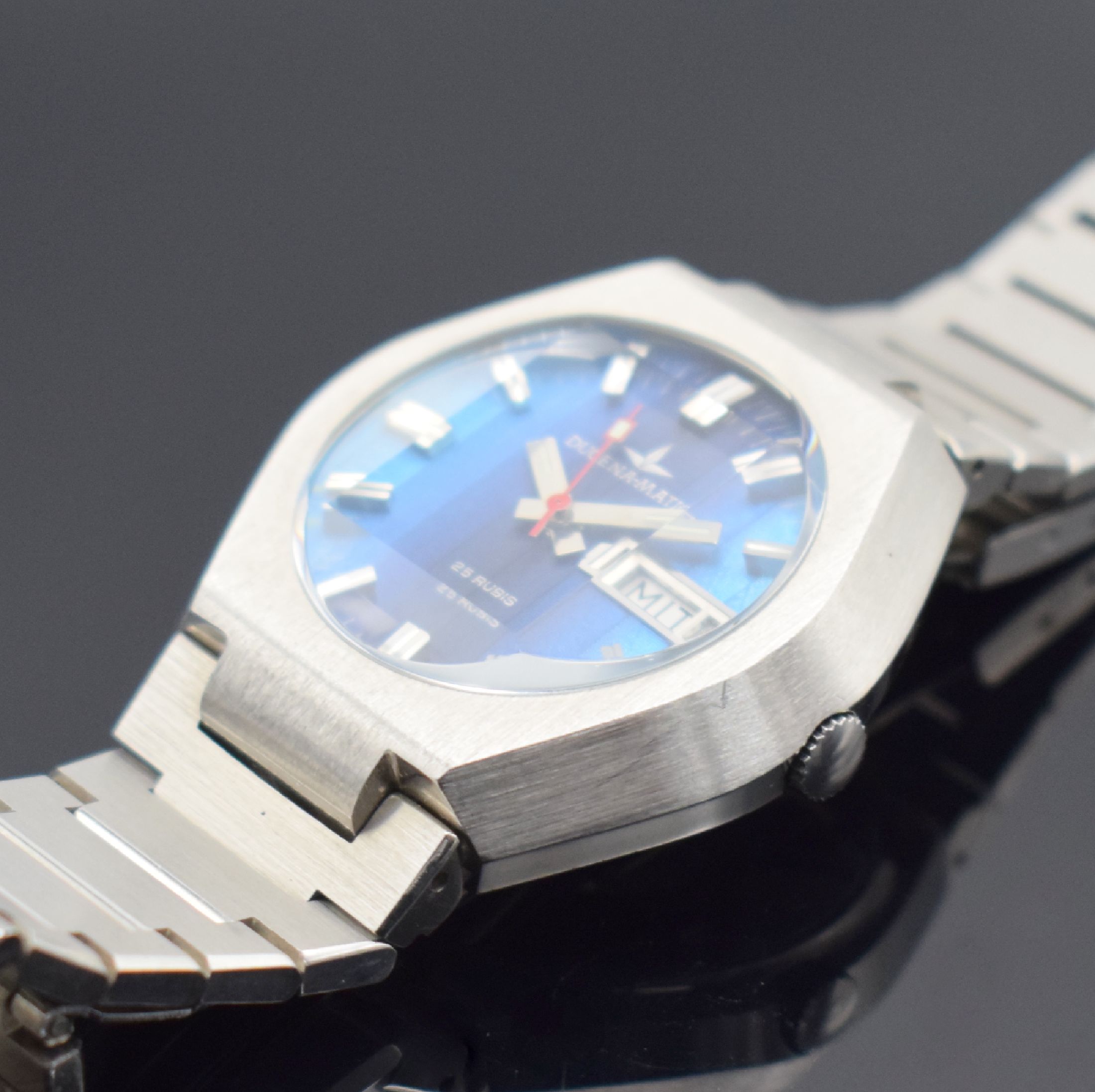 Detail b: DUGENA-MATIC seltene Armbanduhr mit Fume Zifferblatt, Schweiz um 1970, Automatik, Edelstahlgeh., Boden geschr., Gliederband. m. Faltschl., ...