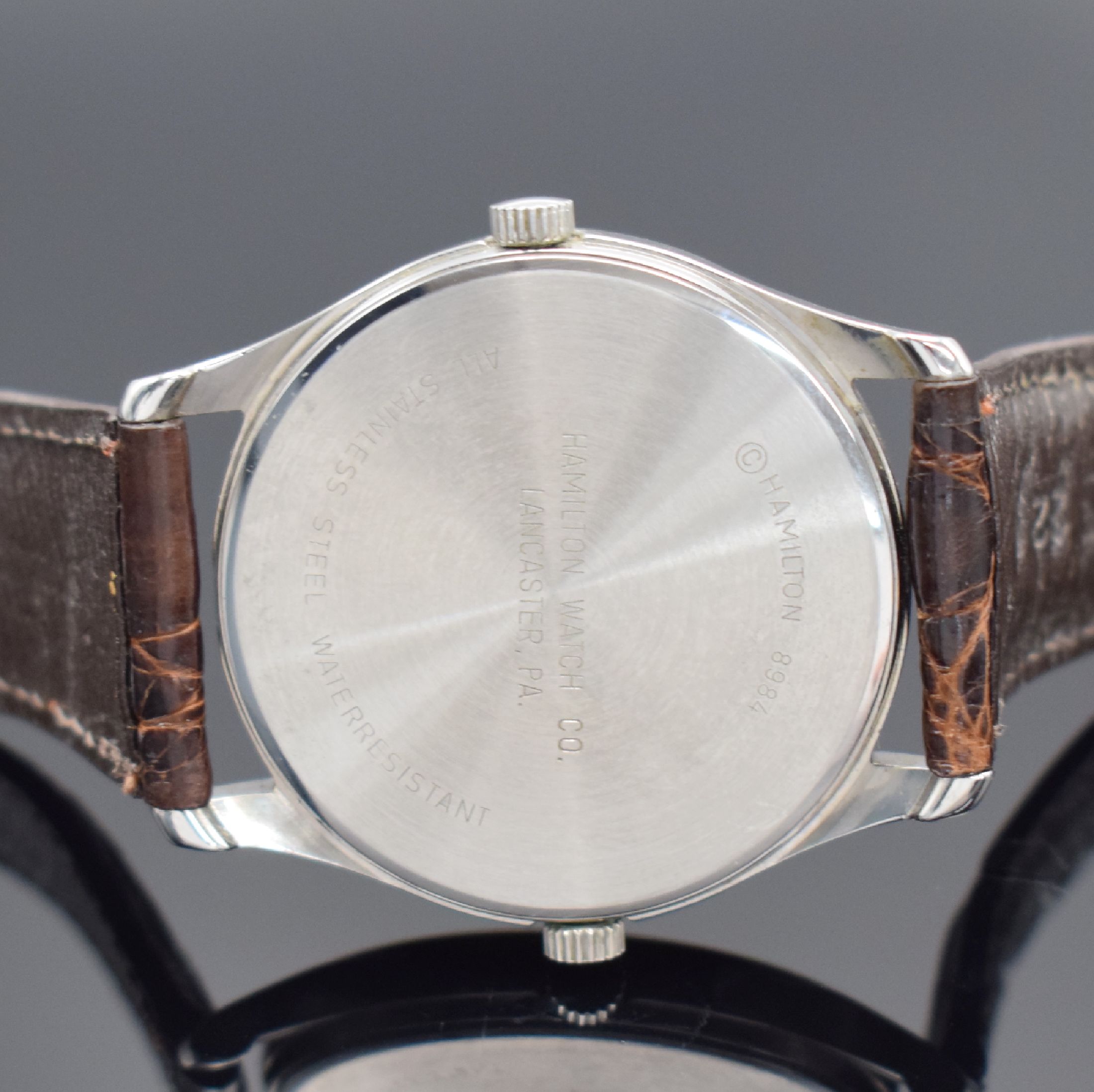 Detail b: 3 Herrenarmbanduhren mit Quarz-Werken, 1) Hamilton in Stahl mit Weltzeit-Anzeige, D. ca. 38 mm, EZ 2, 2) Hamilton Chronograph in Stahl, D. ca. 36 mm, ...