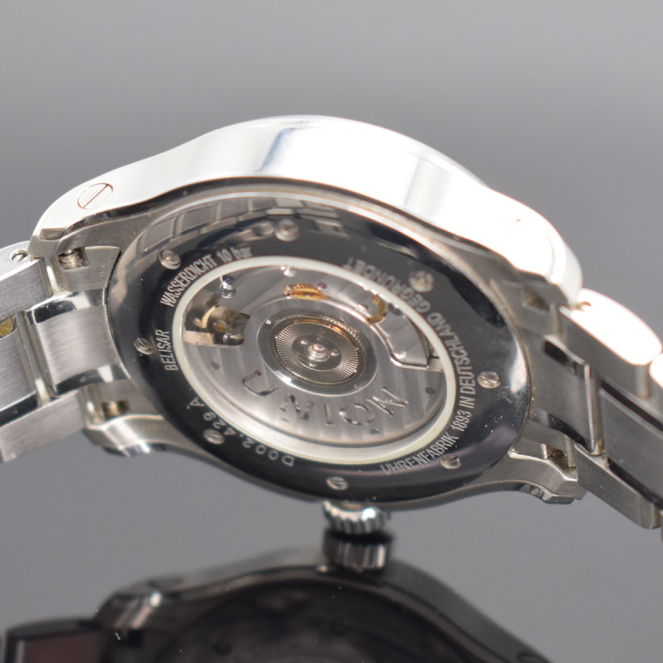Detail e: UNION GLASHÜTTE/SA Belisar GMT Herrenarmbanduhr in Stahl Referenz D002.429 A, Deutschland um 2015, Automatik, beids. vergl. Geh., Boden 8-fach ...