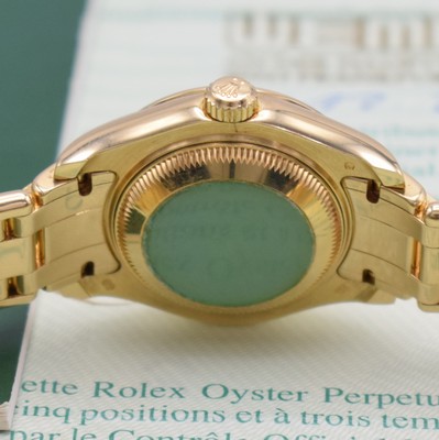 26474085e - ROLEX 18k yellow gold ladies wristwatch Oyster Perpetual Datejust Pearlmaster, self winding, reference 80298, P-series, superlative chronometer officially certified, screwed-down case back & winding crown, factory diamonds set bezel, Pearlmaster bracelet with deployant clasp, mother of pearl dial with Roman numerals, gilded hands, date, diameter approx. 29 mm, length approx. 17 cm, original certificate enclosed, condition 2