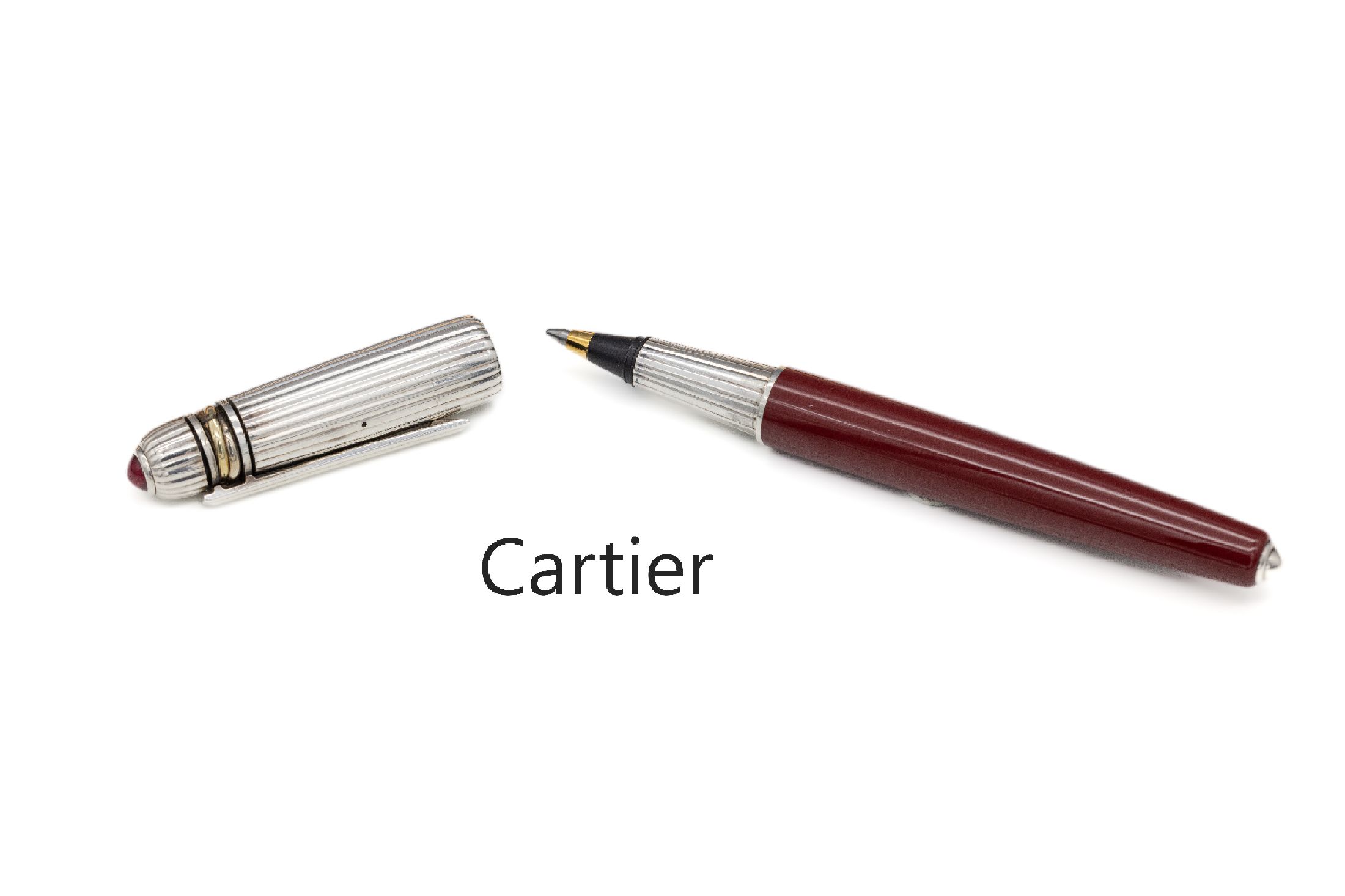 CARTIER Kugelschreiber, Serie "Pasha de Cartier", Korpus rotes Edelharz, Kappe Silber mit rotem Glascabochon, im orig. Etui, mit Papieren ...