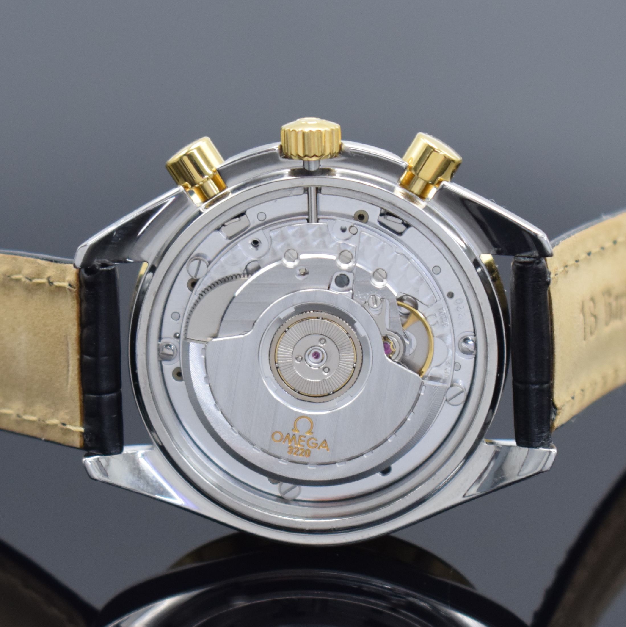 Detail d: OMEGA Speedmaster Herrenchronograph in Stahl/Gold Referenz 175.0032, Schweiz um 1990, Automatik, Lünette m. Tachymeterskala, goldfarb. Zifferbl. m. ...