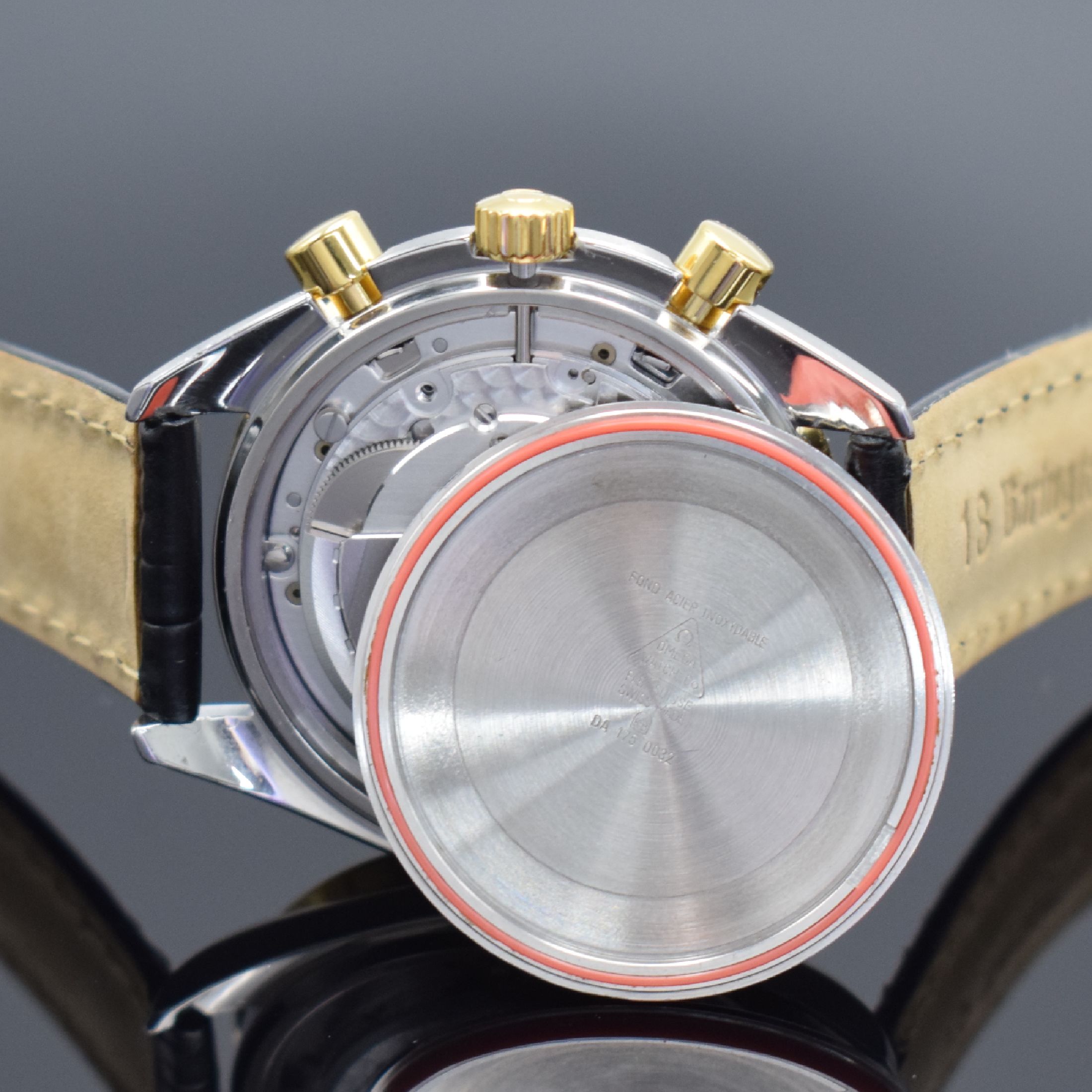 Detail f: OMEGA Speedmaster Herrenchronograph in Stahl/Gold Referenz 175.0032, Schweiz um 1990, Automatik, Lünette m. Tachymeterskala, goldfarb. Zifferbl. m. ...