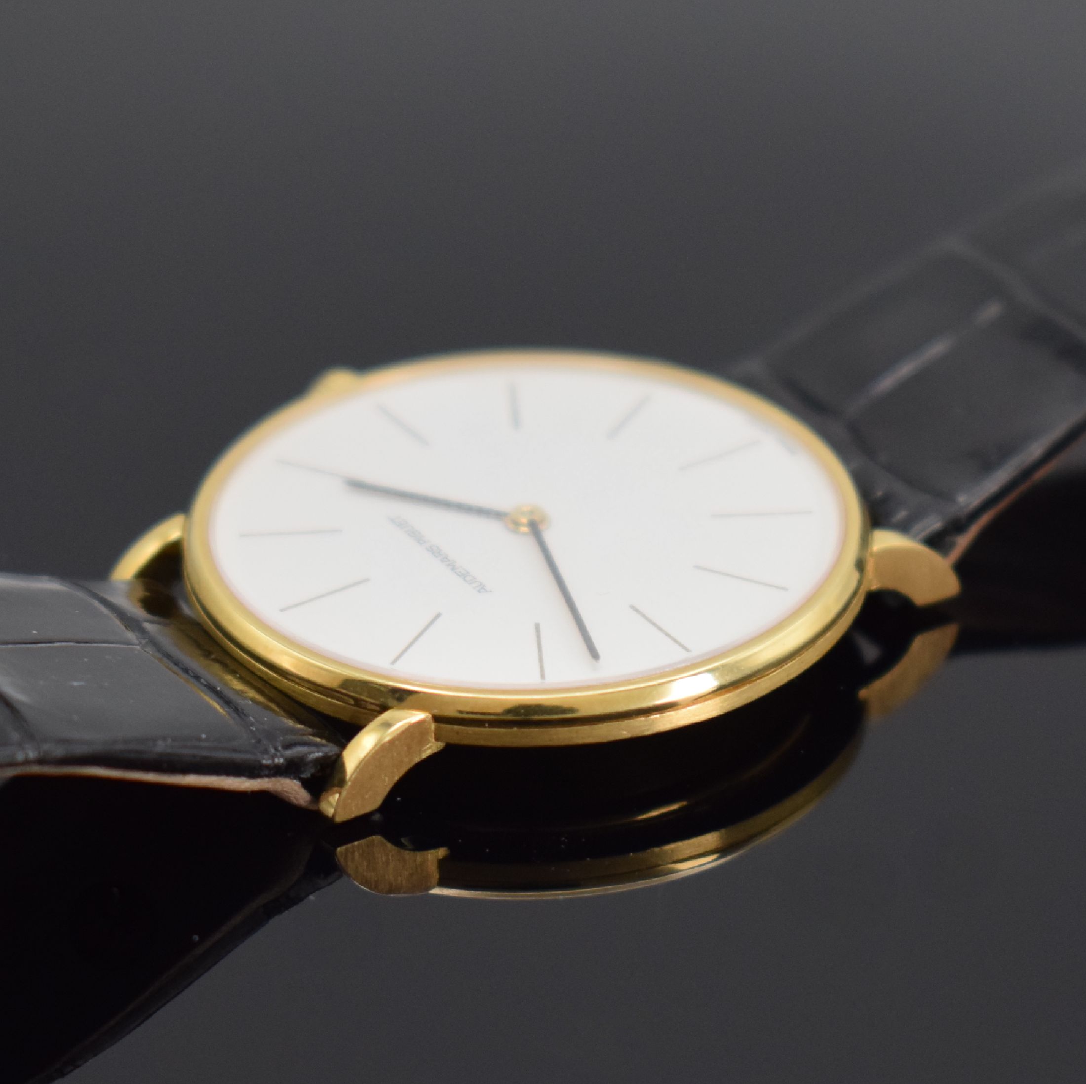Detail b: AUDEMARS PIGUET feine Herrenarmbanduhr in GG 750/000 Referenz 5125BA, Schweiz um 1980, Handaufzug, Boden & Glasrand aufgedr., ultraflache ...
