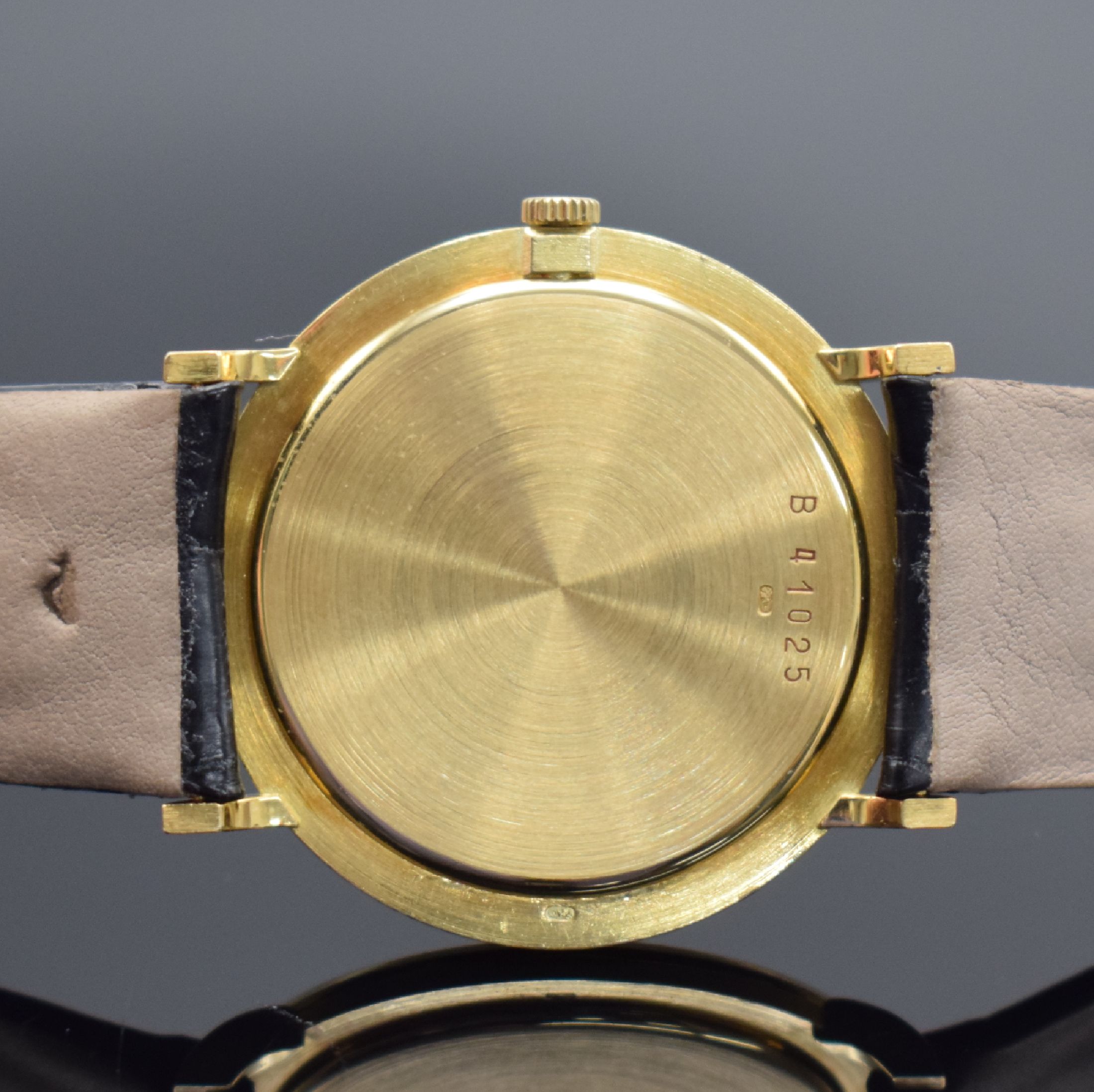 Detail d: AUDEMARS PIGUET feine Herrenarmbanduhr in GG 750/000 Referenz 5125BA, Schweiz um 1980, Handaufzug, Boden & Glasrand aufgedr., ultraflache ...