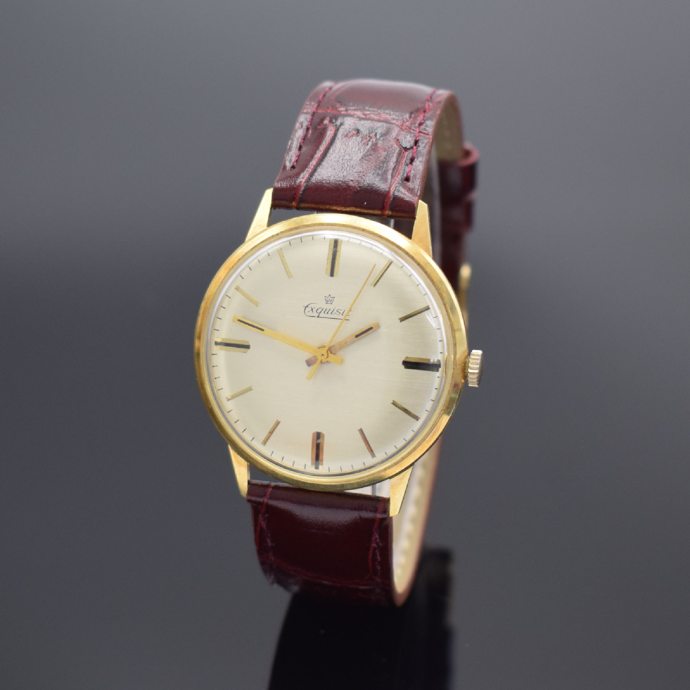 EXQUISIT Armbanduhr in GG 585/000, Schweiz um 1965, Handaufzug, Boden aufgedr., silb. Zifferbl. m. gold. Std.-Ind. & Zeigern, Kal. ETA 2391, 17 St., ...