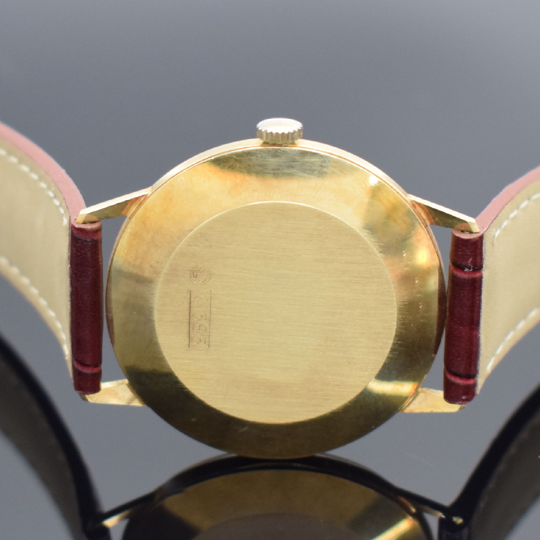 Detail c: EXQUISIT Armbanduhr in GG 585/000, Schweiz um 1965, Handaufzug, Boden aufgedr., silb. Zifferbl. m. gold. Std.-Ind. & Zeigern, Kal. ETA 2391, 17 St., ...