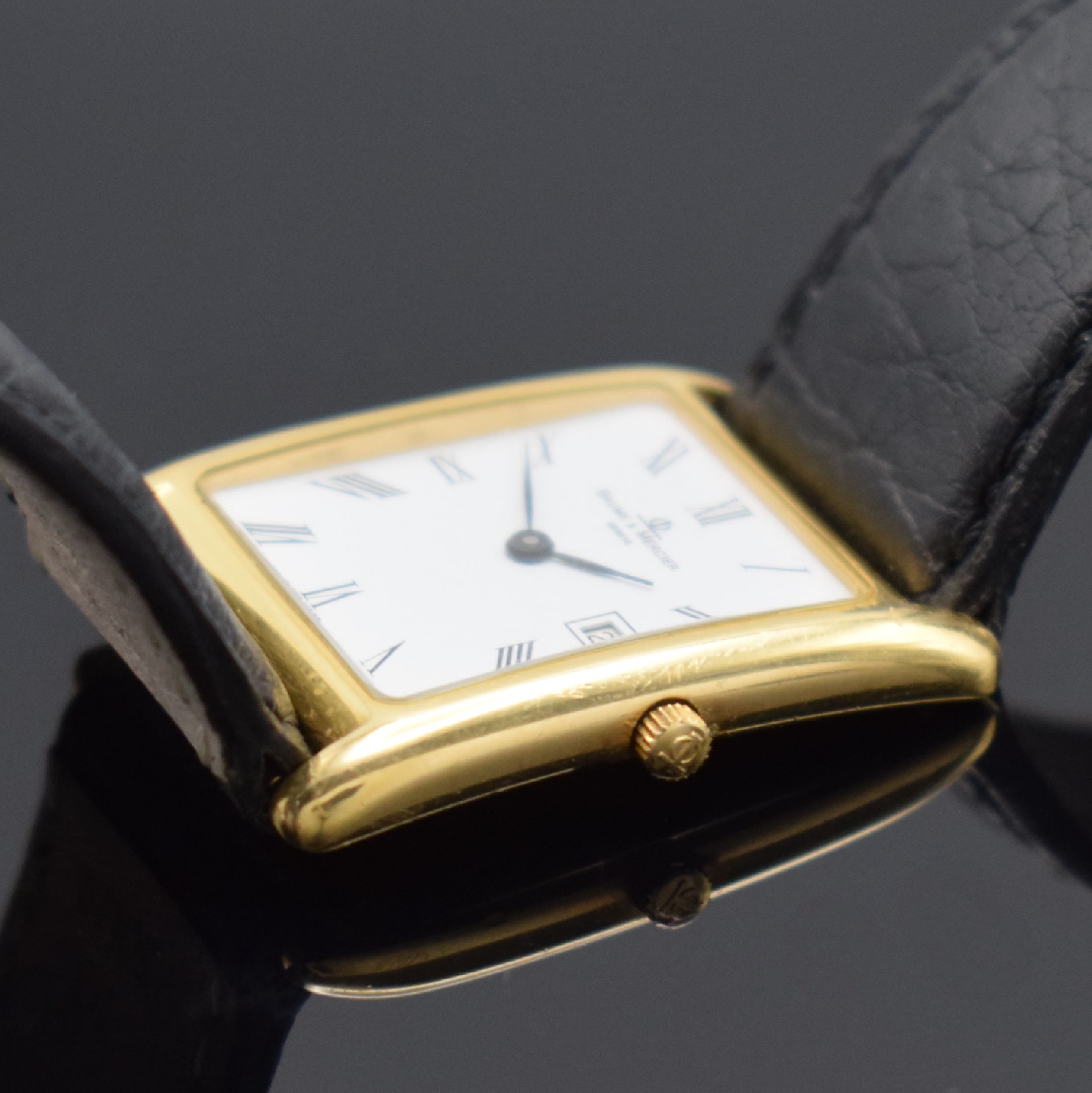 Detail b: BAUME & Mercier Armbanduhr in GG 750/000 Referenz 17342, Schweiz um 1995, quarz, 2- teil. Geh., Boden 4-fach verschr., emailfarb. Zifferbl. m. röm. ...