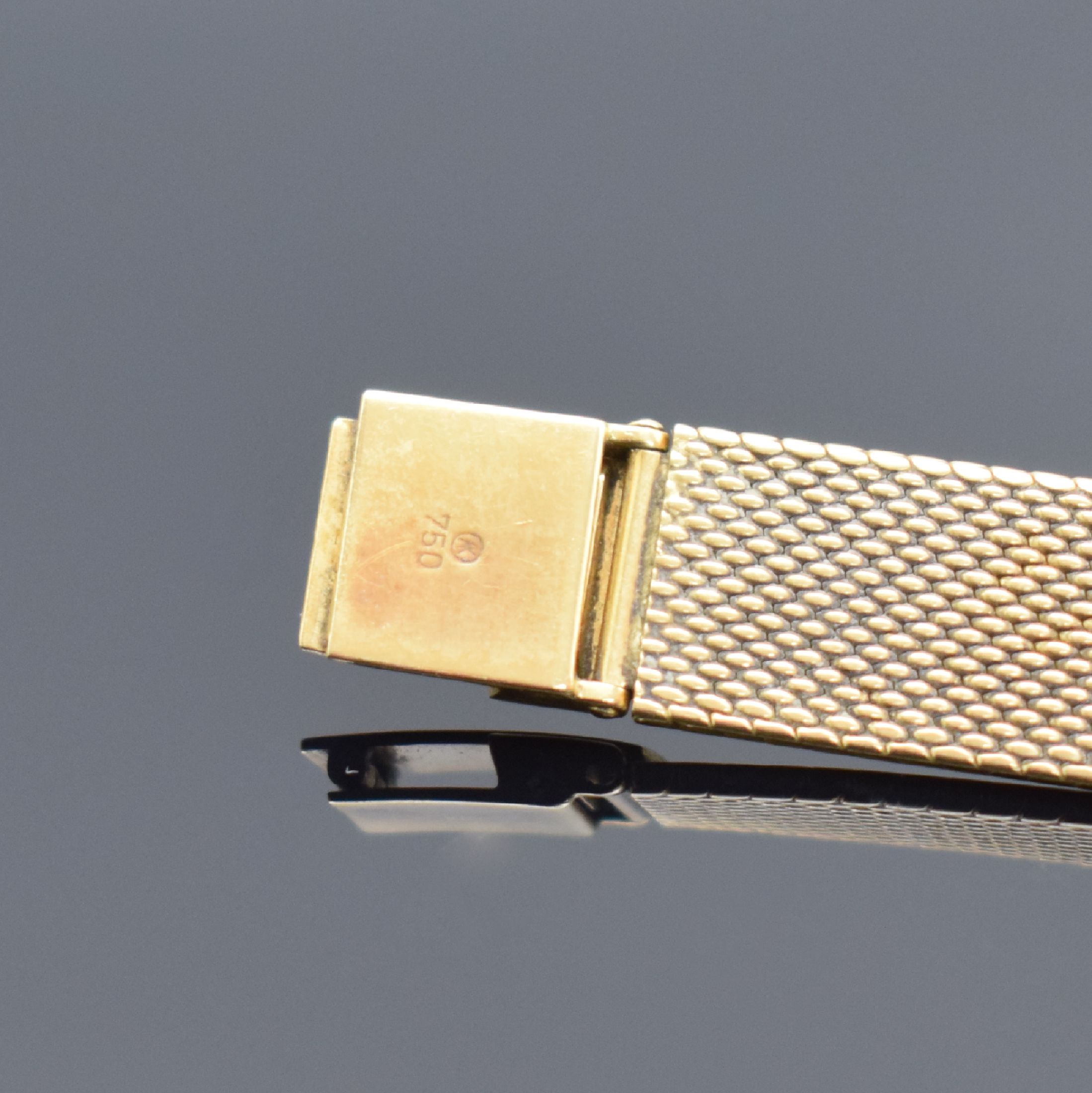 Detail b: KURZ Armbanduhr in GG 750/000, Handaufzug, Schweiz um 1965, Boden aufgedr., Milanaiseband, gold. Zifferbl. altersbed. fl., gold. Zeiger, Anz. v. Std. ...