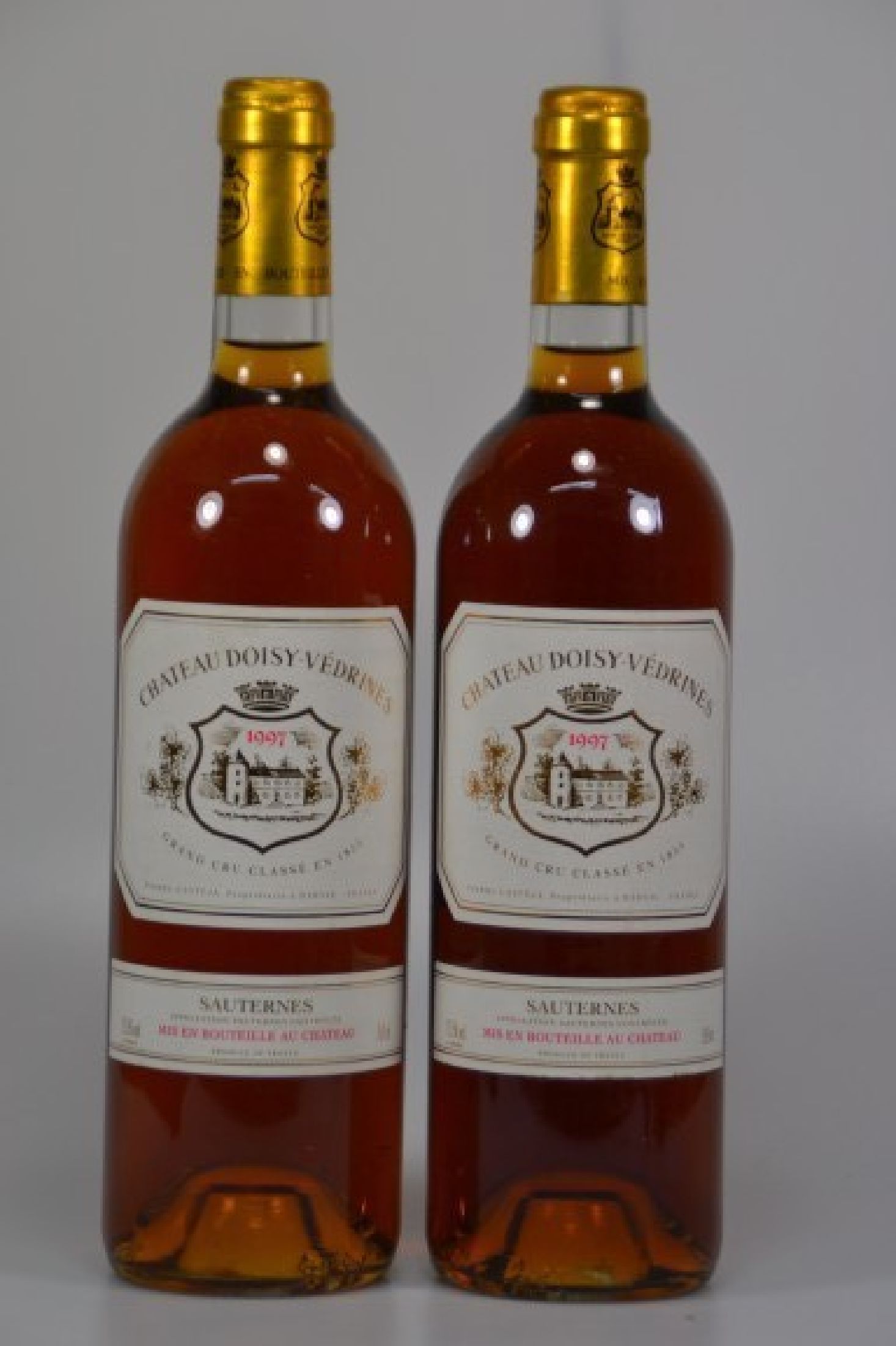 2 Flaschen 1997 Chateau Doisy-Vedrines, Sauternes, je 750ml, 13,5% Vol., Into Neck/High Fill, unverkostet
