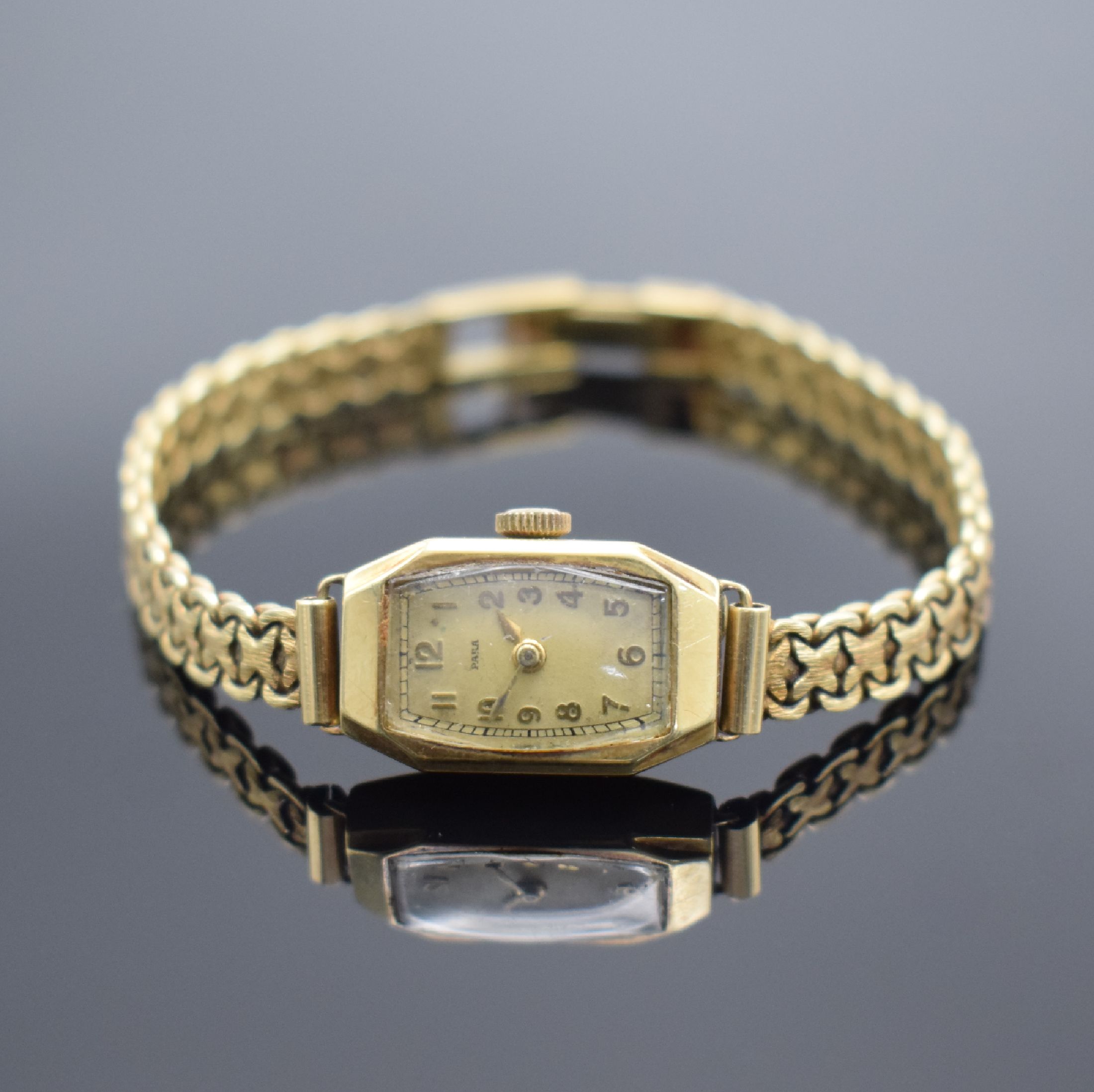 PARA Damenarmbanduhr in GG 585/000, Schweiz um 1965, Handaufzug, Scharnierboden dell., Zifferbl. pat., arab. Zahlen & gold. Zeiger, verg. Ankerwerk, ...
