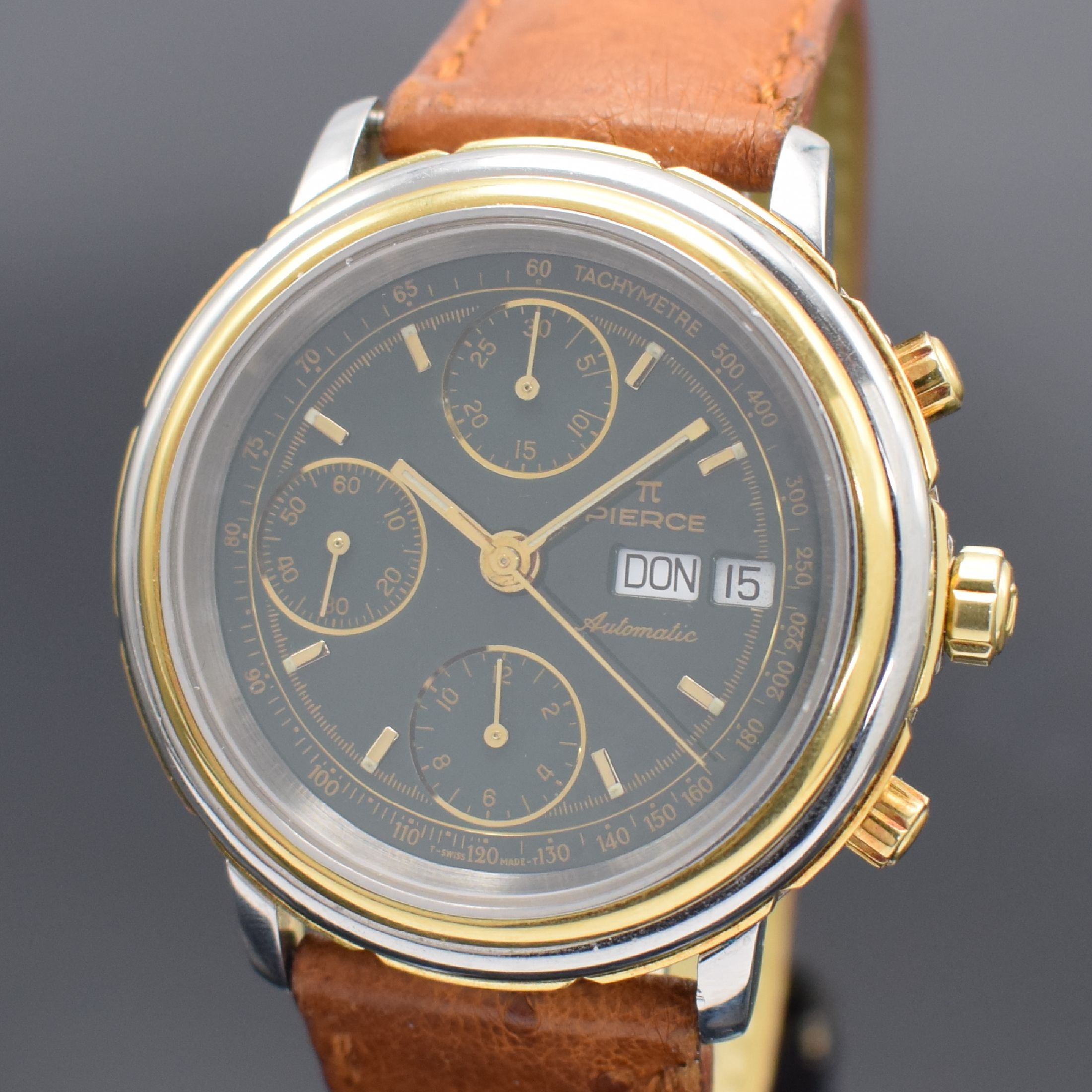 Detail a: PIERCE Herrenarmbanduhr mit Chronograph in Stahl/Gold, Schweiz um 2005, Automatik, beids. vergl. Geh., Boden aufgedr., Lünette in GG 750/000, orig. ...