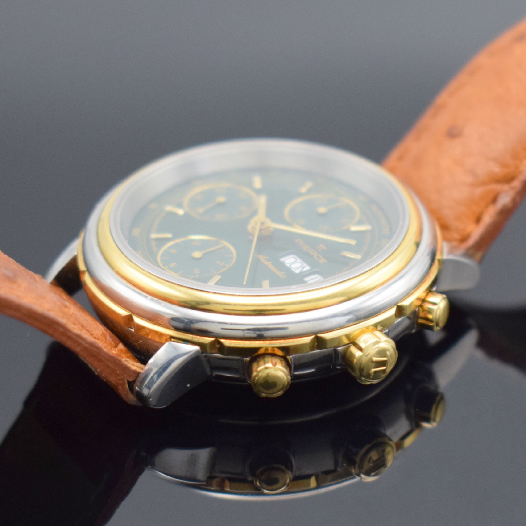 Detail c: PIERCE Herrenarmbanduhr mit Chronograph in Stahl/Gold, Schweiz um 2005, Automatik, beids. vergl. Geh., Boden aufgedr., Lünette in GG 750/000, orig. ...