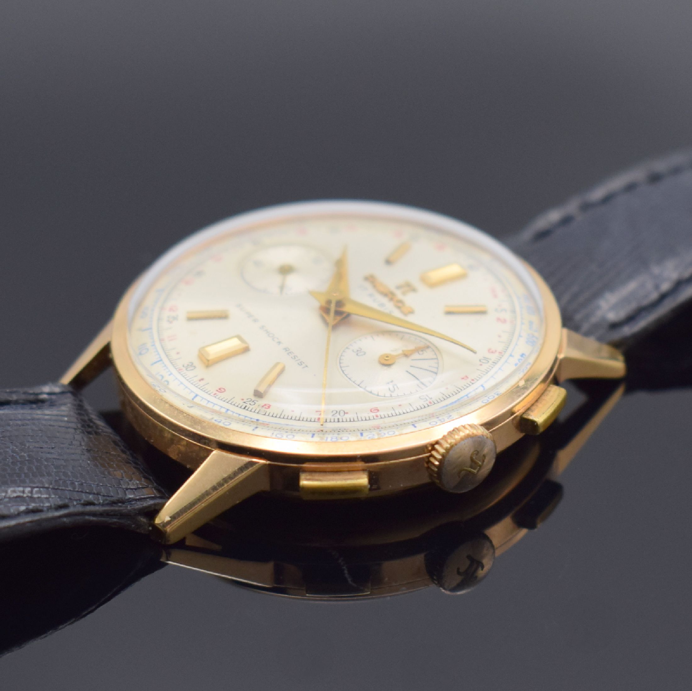 Detail b: PIERCE Herrenarmbanduhr mit Schaltradchronograph in RG 750/000, Schweiz um 1955, Handaufzug, dell. Boden & Glasrand aufgedr., silb. Zifferbl. m. ...