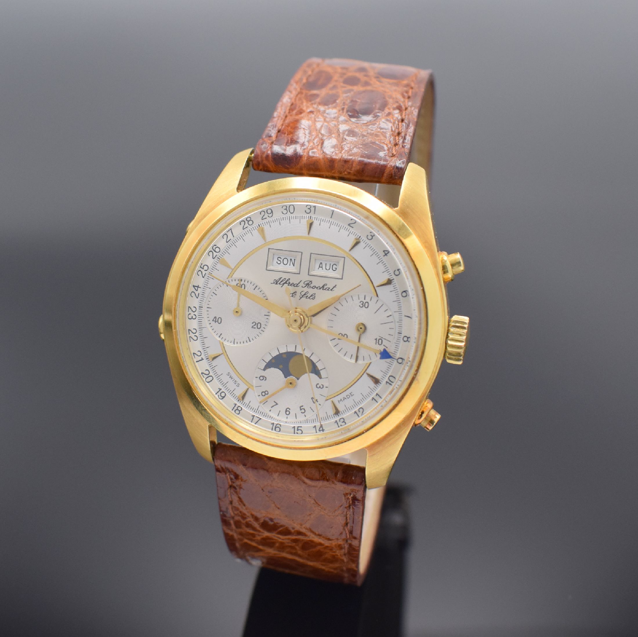 ALFRED ROCHAT & FILS Schaltradchronograph mit Vollkalender Kaliber Valjoux 88 in GG 750/000, Schweiz verk. lt. beil. Zertifikat 12/1995, Handaufzug, ...