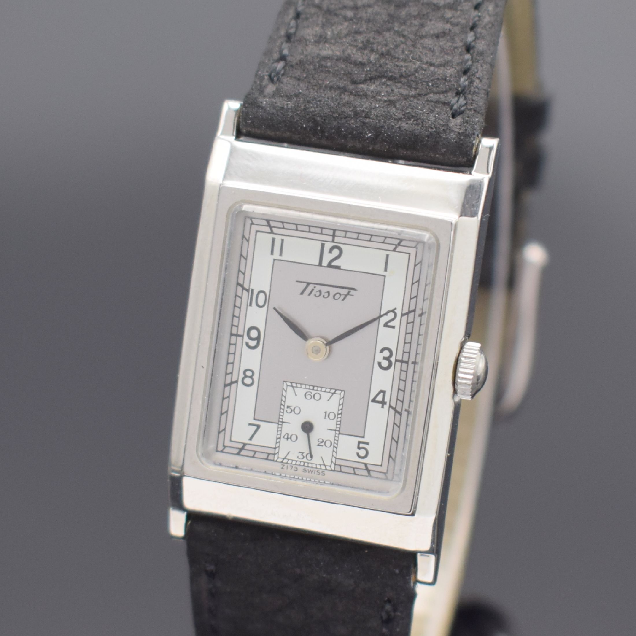 Detail a: TISSOT rechteckige Armbanduhr in Stahl, Schweiz verk. lt. beil. Garantie 12/1995, quarz, Boden 4-fach verschr., orig. Lederband m. Dornschl., silb. ...