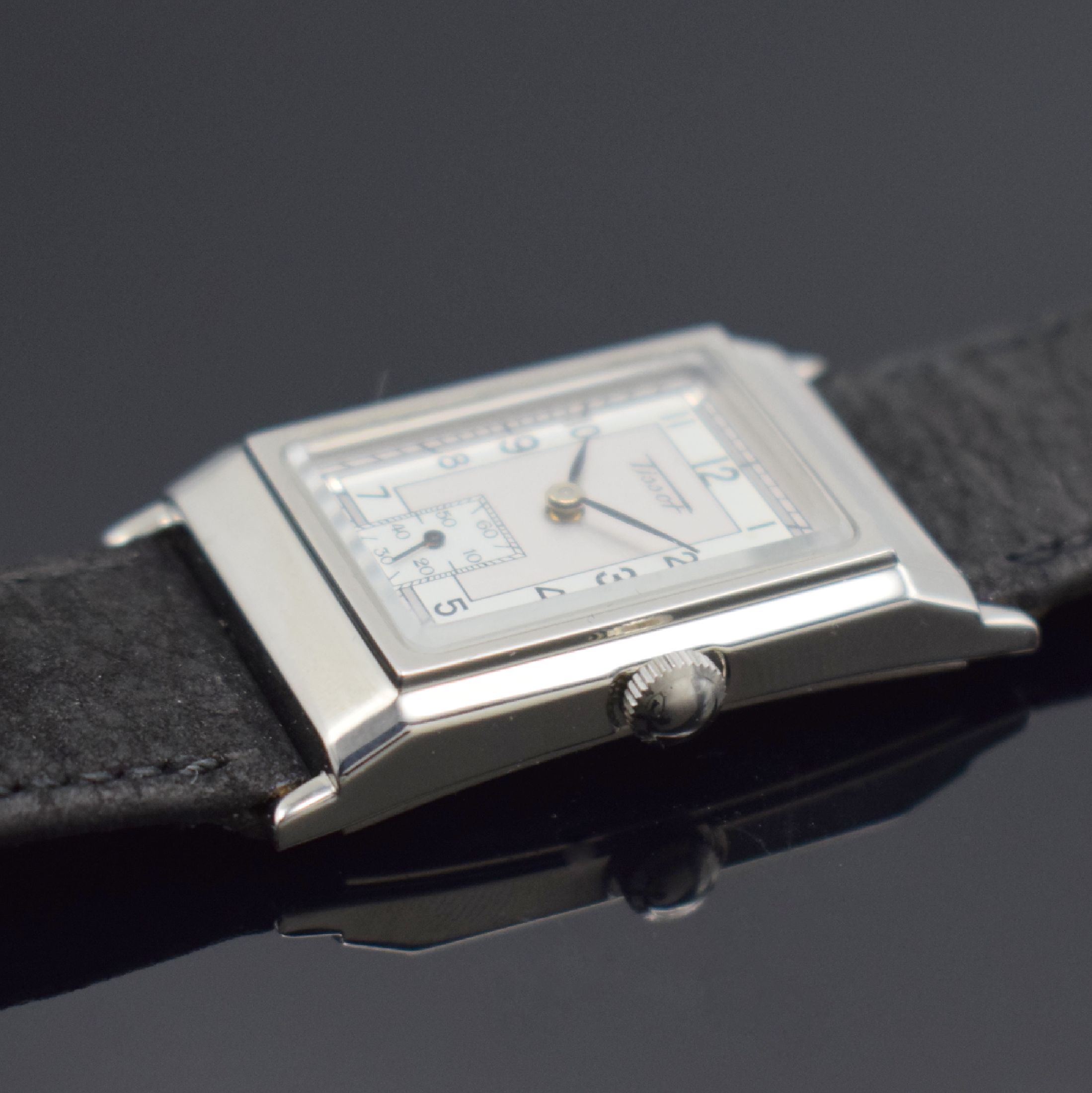 Detail c: TISSOT rechteckige Armbanduhr in Stahl, Schweiz verk. lt. beil. Garantie 12/1995, quarz, Boden 4-fach verschr., orig. Lederband m. Dornschl., silb. ...