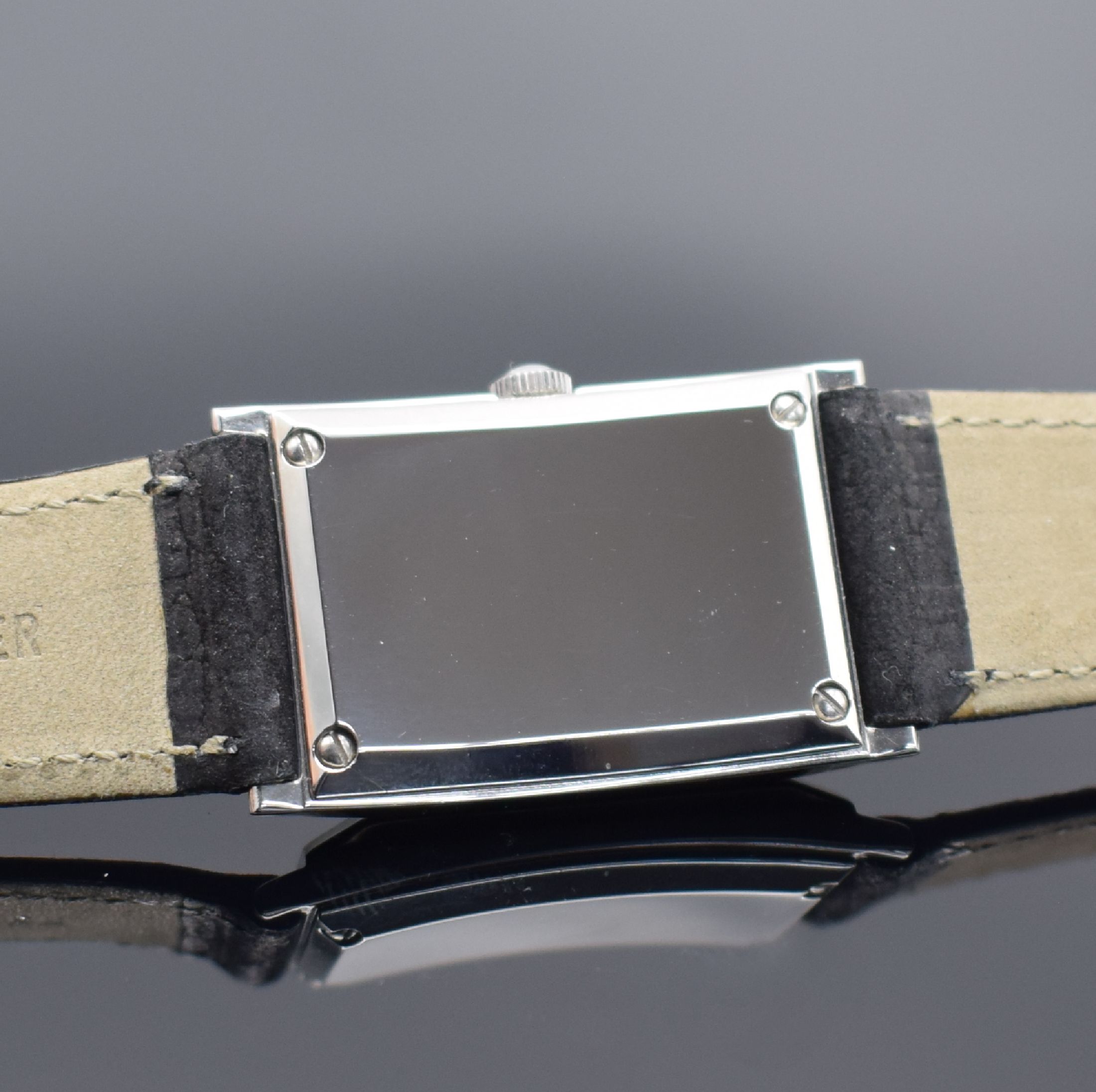 Detail d: TISSOT rechteckige Armbanduhr in Stahl, Schweiz verk. lt. beil. Garantie 12/1995, quarz, Boden 4-fach verschr., orig. Lederband m. Dornschl., silb. ...