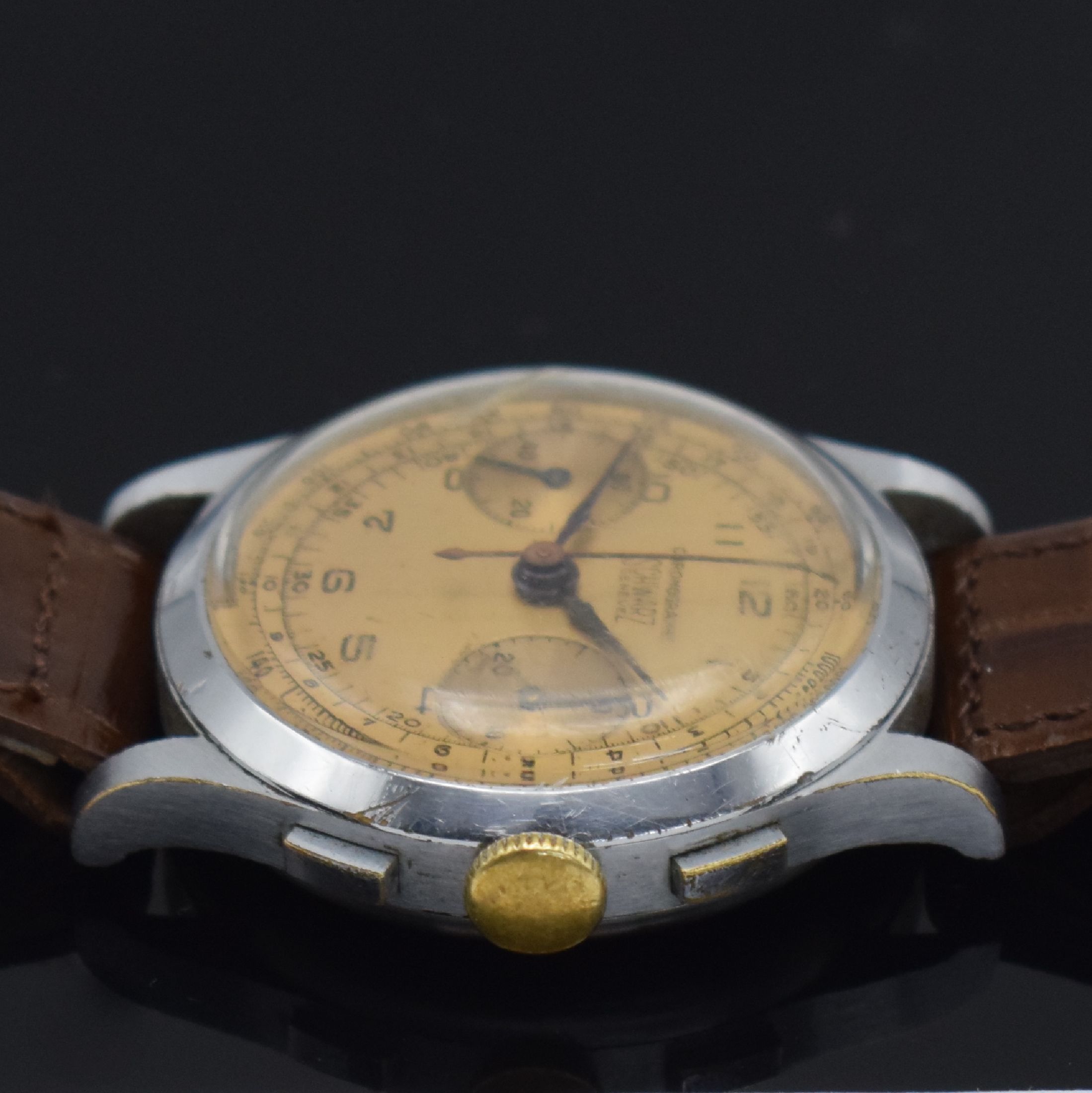 Detail c: SCHWARZ Geneve Herrenarmbanduhr mit Chronograph, Schweiz um 1950, Handaufzug, verchr. Geh., Stahlboden aufgedr., gold. Zifferblatt m. arab. Zahlen, ...