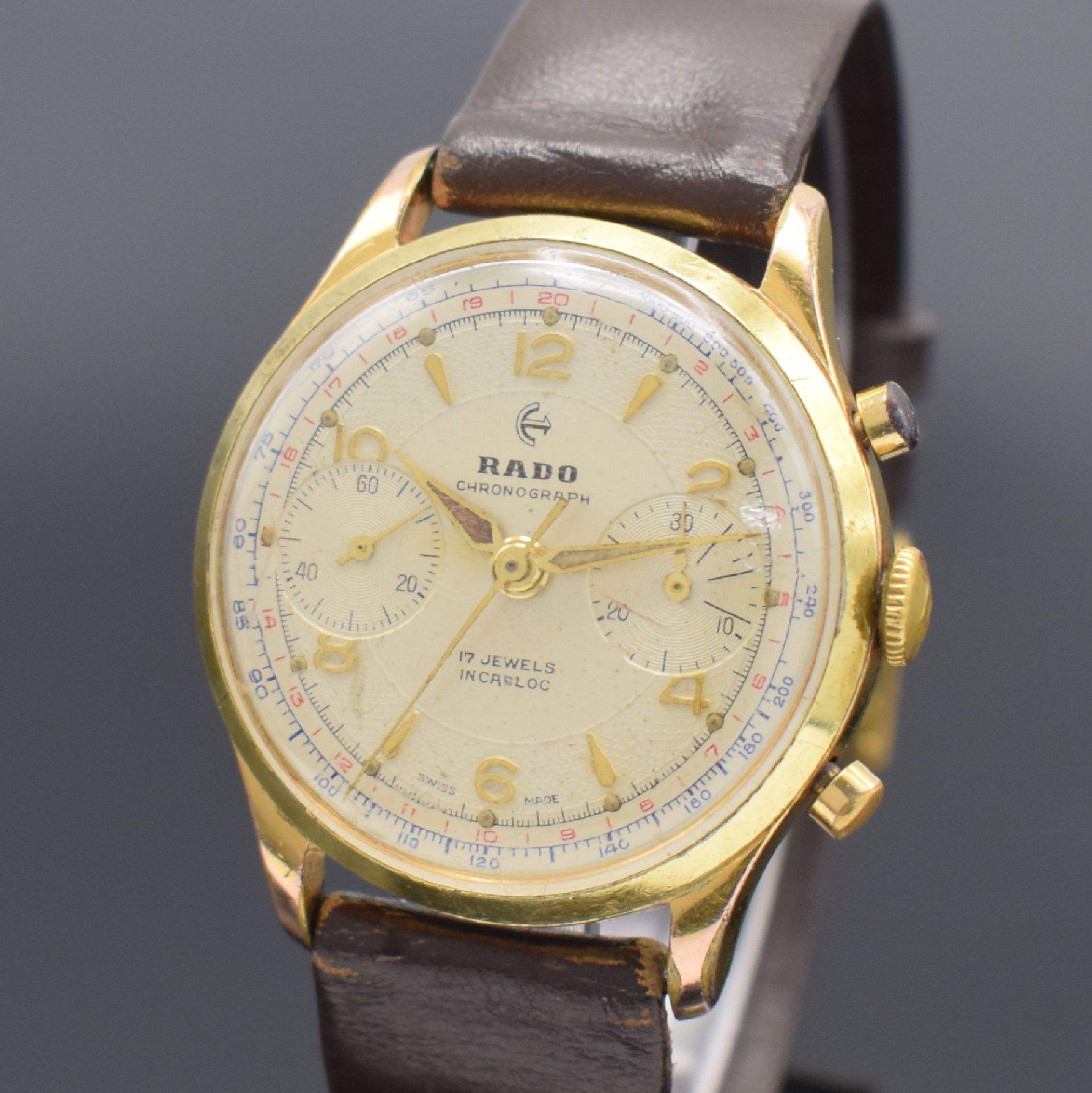 Detail a: RADO Herrenarmbanduhr mit Chronograph, Schweiz um 1960, Handaufzug, verg. Gehäuse, Stahlboden & Glasrand aufgedr., silb. Zifferbl. m. aufges. gold. ...