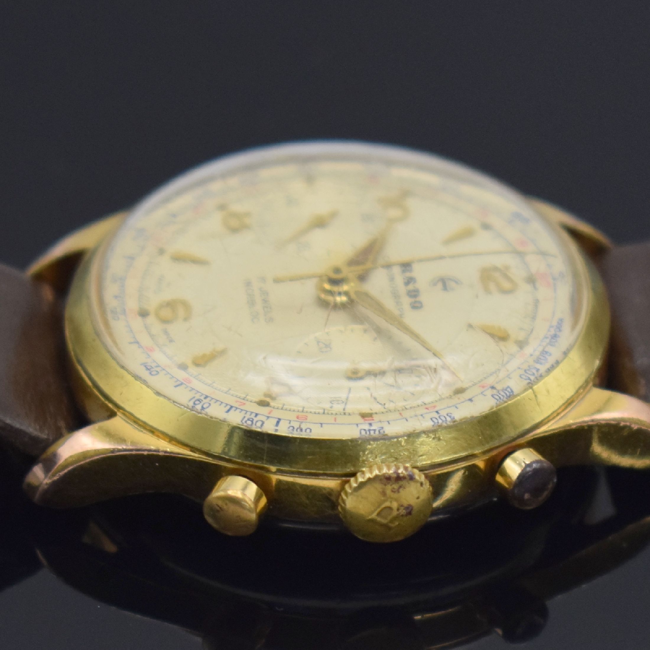 Detail c: RADO Herrenarmbanduhr mit Chronograph, Schweiz um 1960, Handaufzug, verg. Gehäuse, Stahlboden & Glasrand aufgedr., silb. Zifferbl. m. aufges. gold. ...
