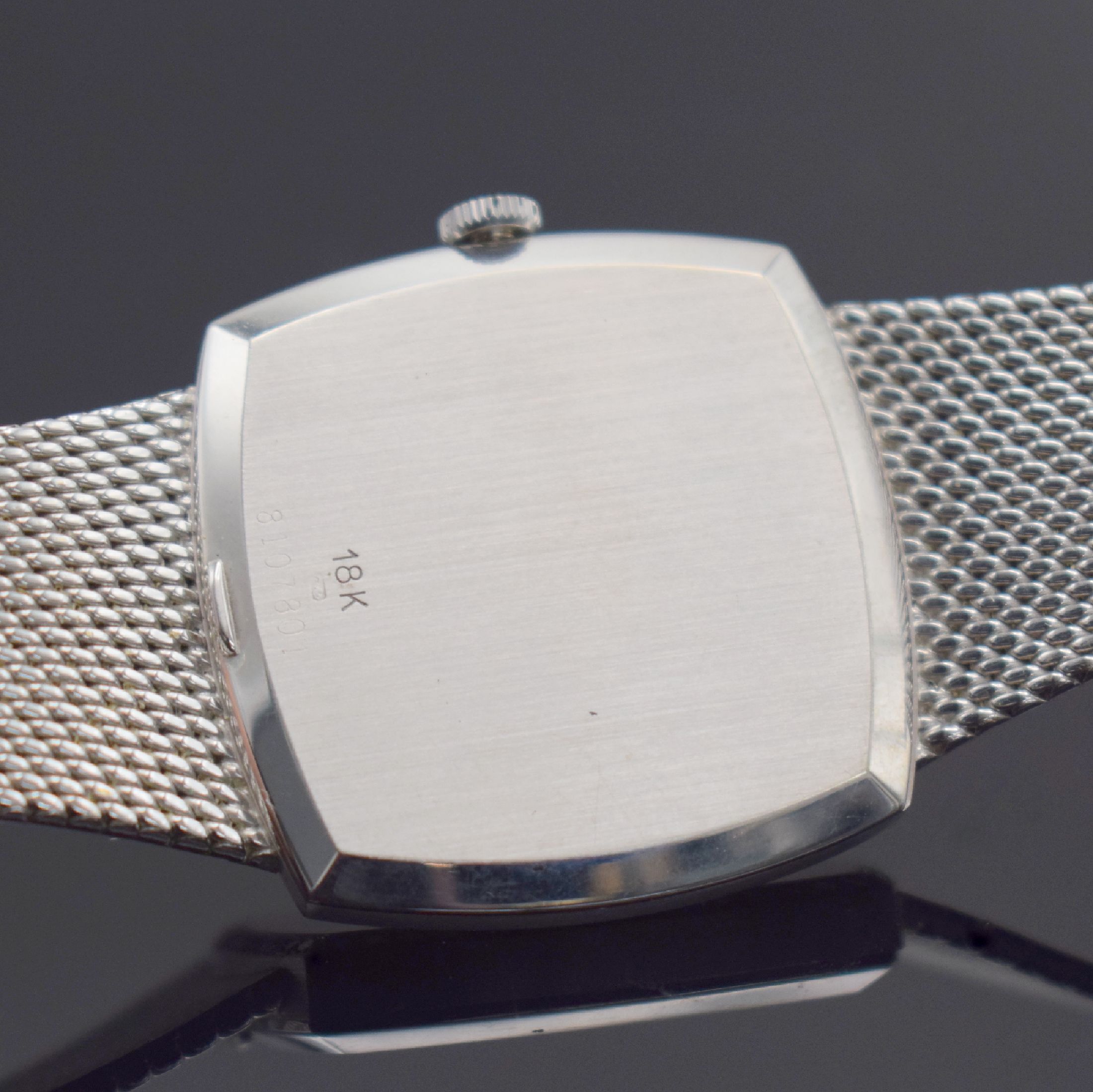 Detail e: EBEL Herrenarmbanduhr in WG 750/000 Referenz 8107 B, Schweiz um 1975, Handaufzug, 2-teil. Geh., Boden aufgedr., Lünette m. Diamanten bes., silb. ...