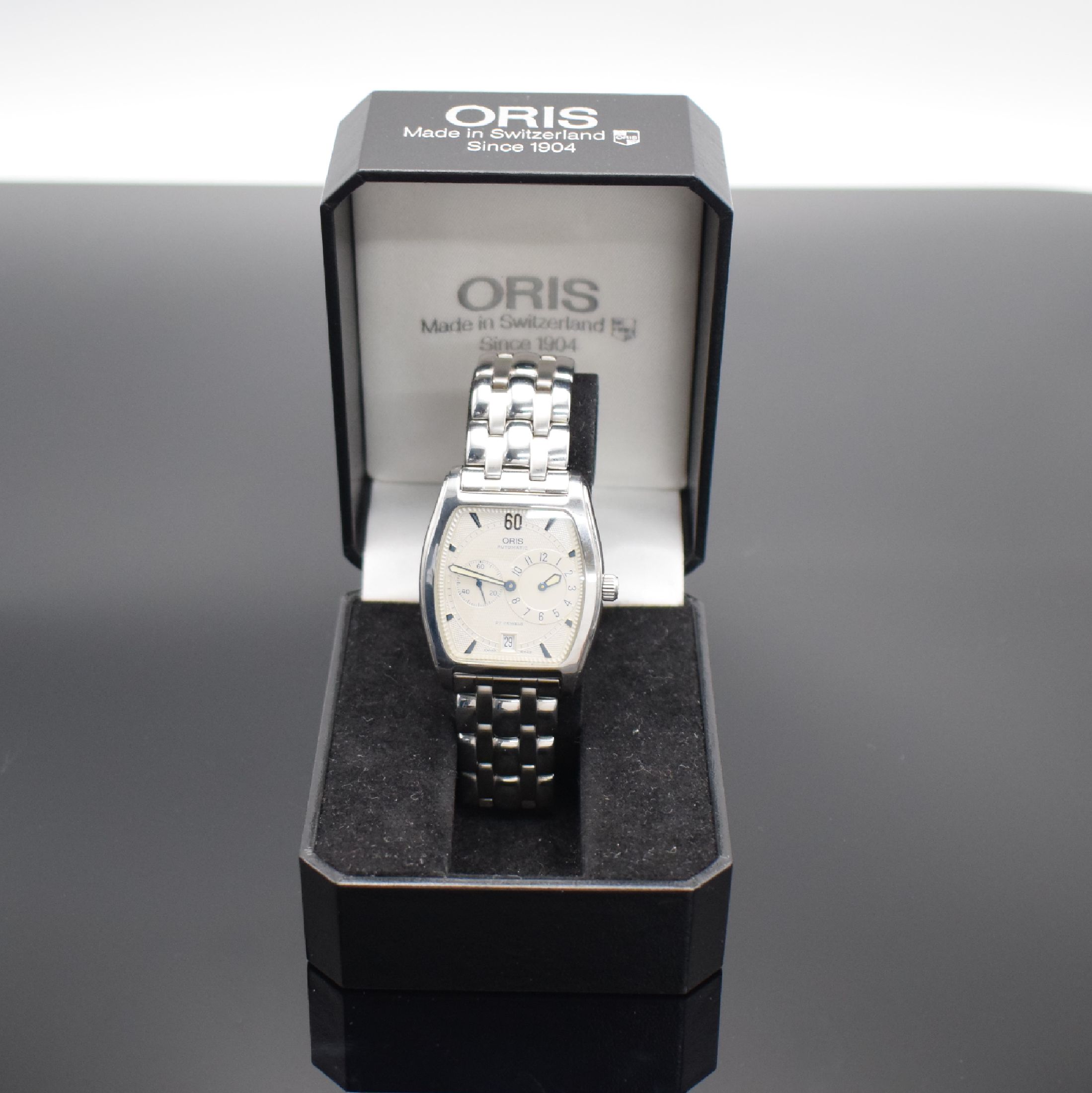 Detail e: ORIS Regulateur Herrenarmbanduhr Referenz 7471, Automatik, Schweiz um 1995, tonneauförmiges Edelstahlgeh. inkl. orig. Gliederband m. dopp. ...