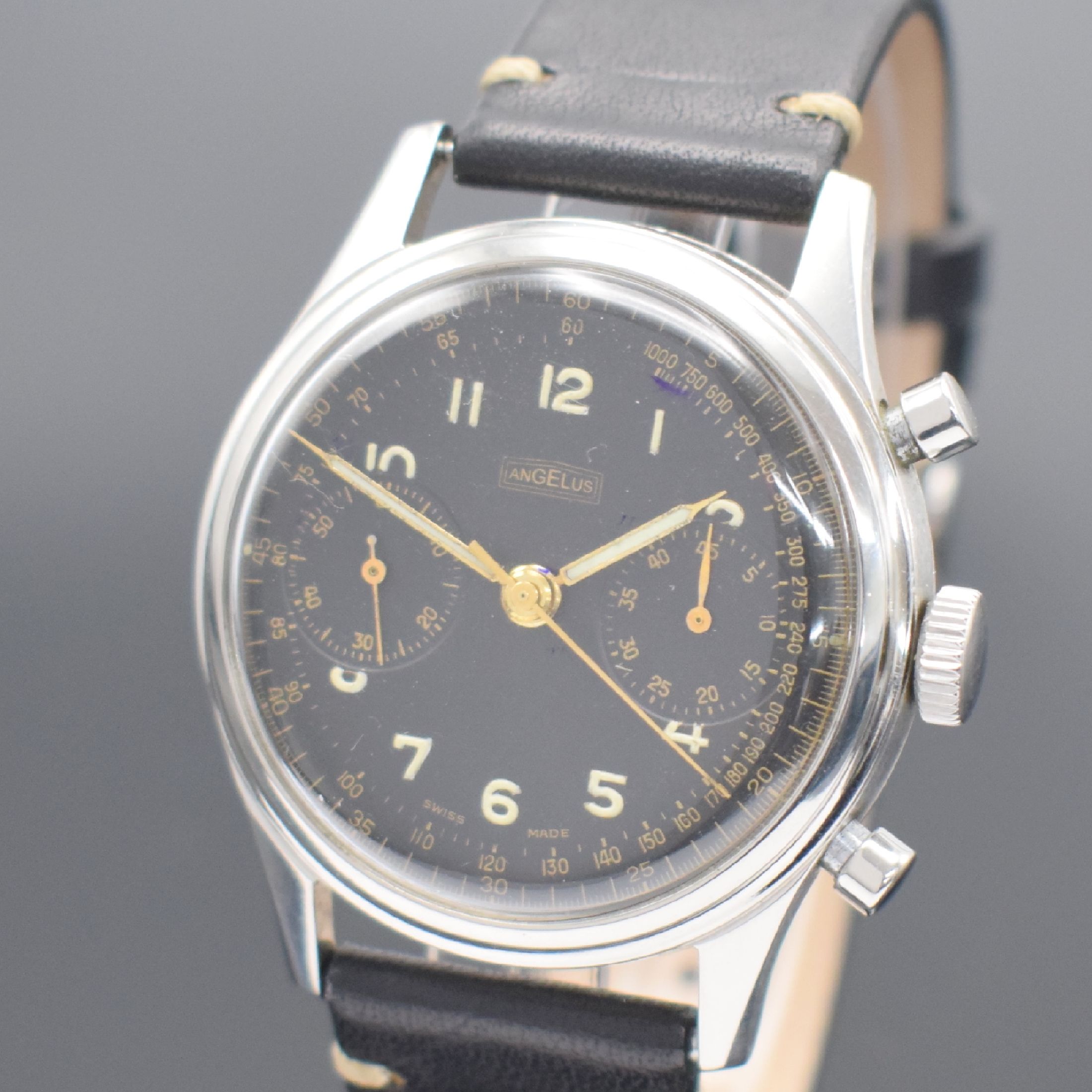 Detail a: ANGELUS Herrenchronograph mit Schaltrad in Stahl, Schweiz um 1945, Handaufzug, Boden aufgedr., schwarzes Zifferbl. rest., arab. Leuchtzahlen, ...