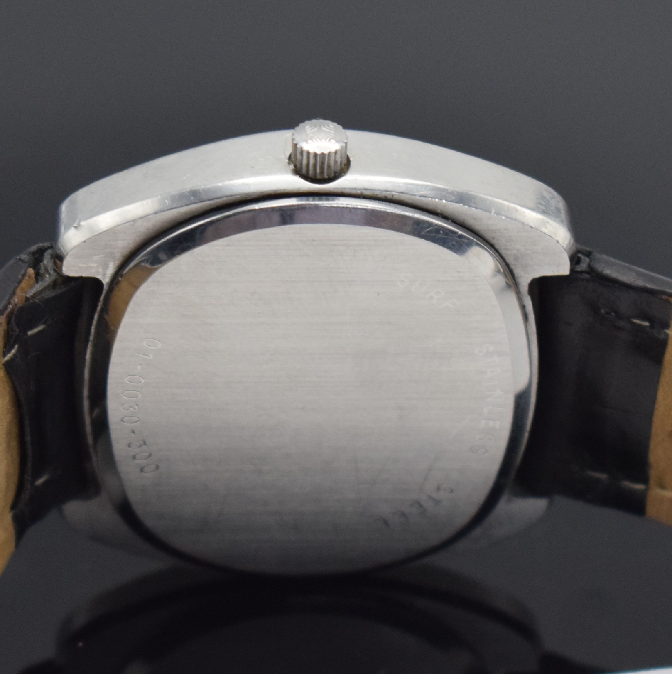 Detail d: MOVADO ZENITH XL-Tronic Herrenarmbanduhr mit Stimmgabelschwinger Kaliber 50.0, Schweiz um 1970, massives 2-teil. Geh., Boden aufgedr., silb. strukt. ...