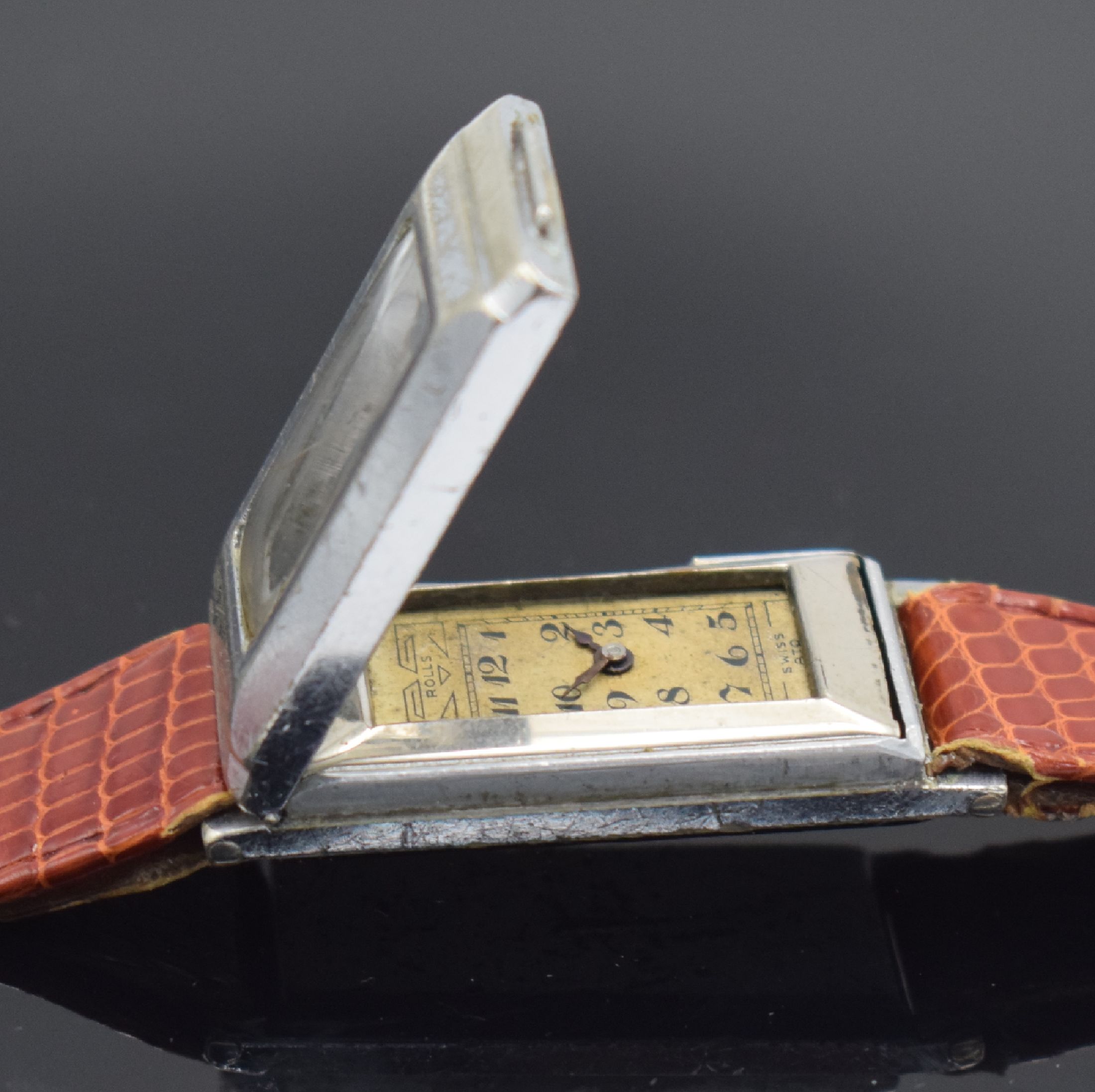 Detail e: ROLLS ATO seltene Armbanduhr mit früher Rüttelautomatik, Schweiz um 1930, verchr. Scharniergeh., sign. orig. Zifferbl. m. email. arab. Zahlen, ...