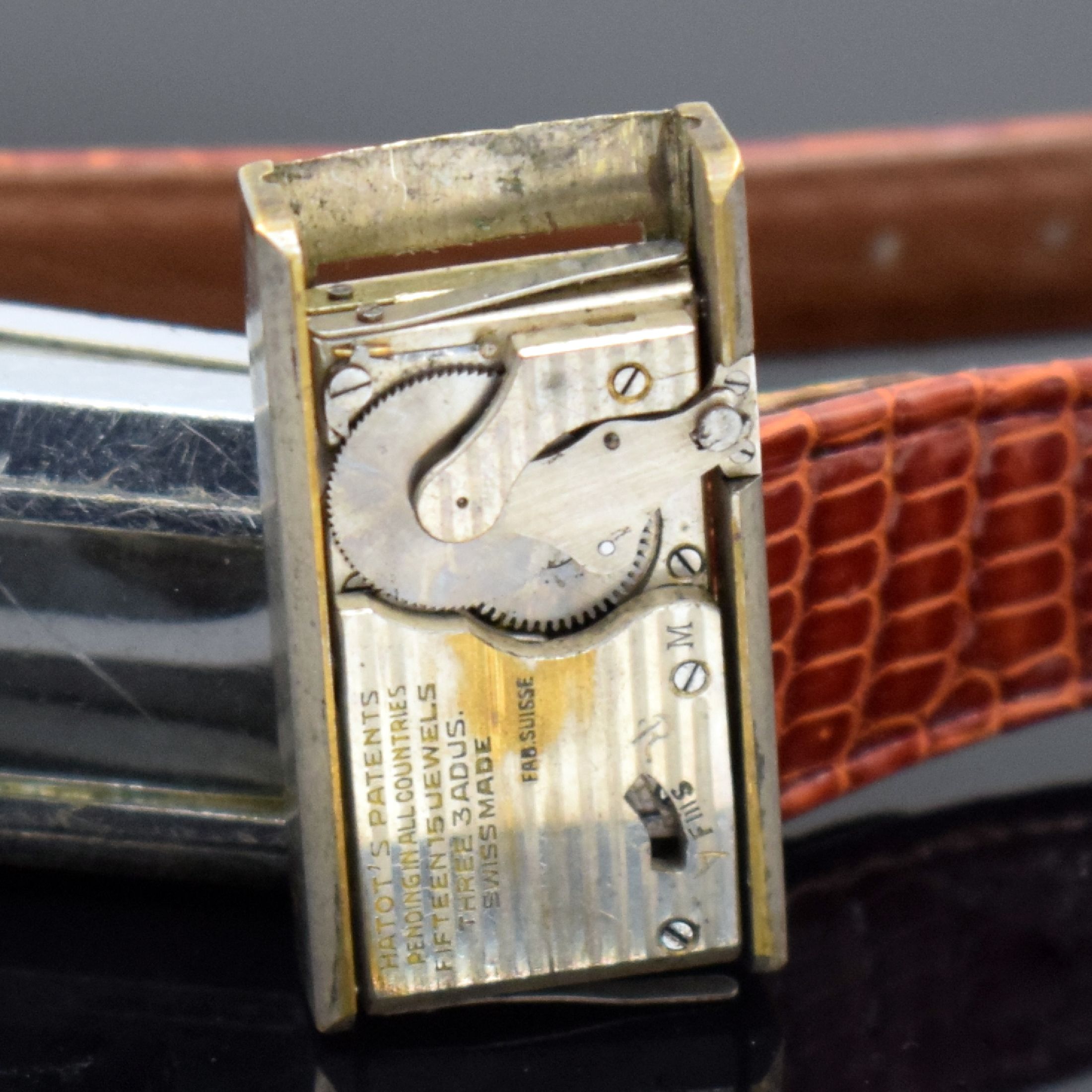 Detail k: ROLLS ATO seltene Armbanduhr mit früher Rüttelautomatik, Schweiz um 1930, verchr. Scharniergeh., sign. orig. Zifferbl. m. email. arab. Zahlen, ...