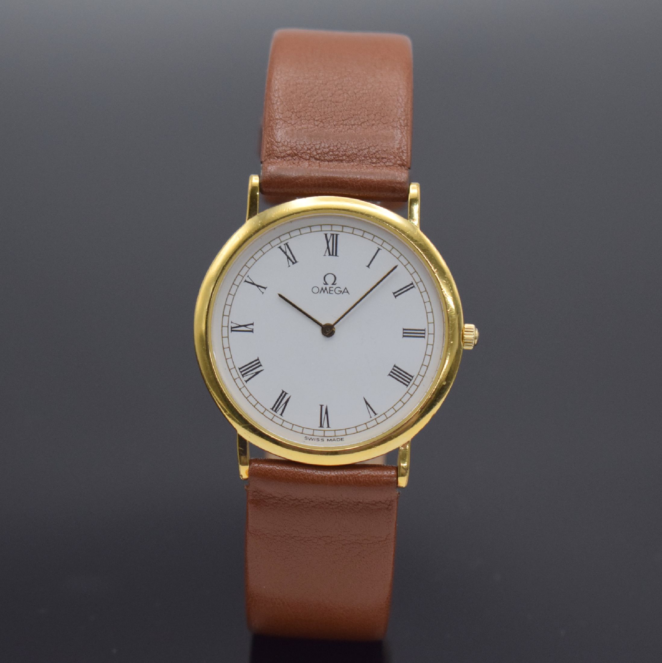 OMEGA De Ville Armbanduhr, Schweiz um 1990, quarz, Ref. 195 0075.1, verg. Gehäuse, Stahlboden aufgedr., weißes Zifferbl. m. röm. Zahlen, gold. ...