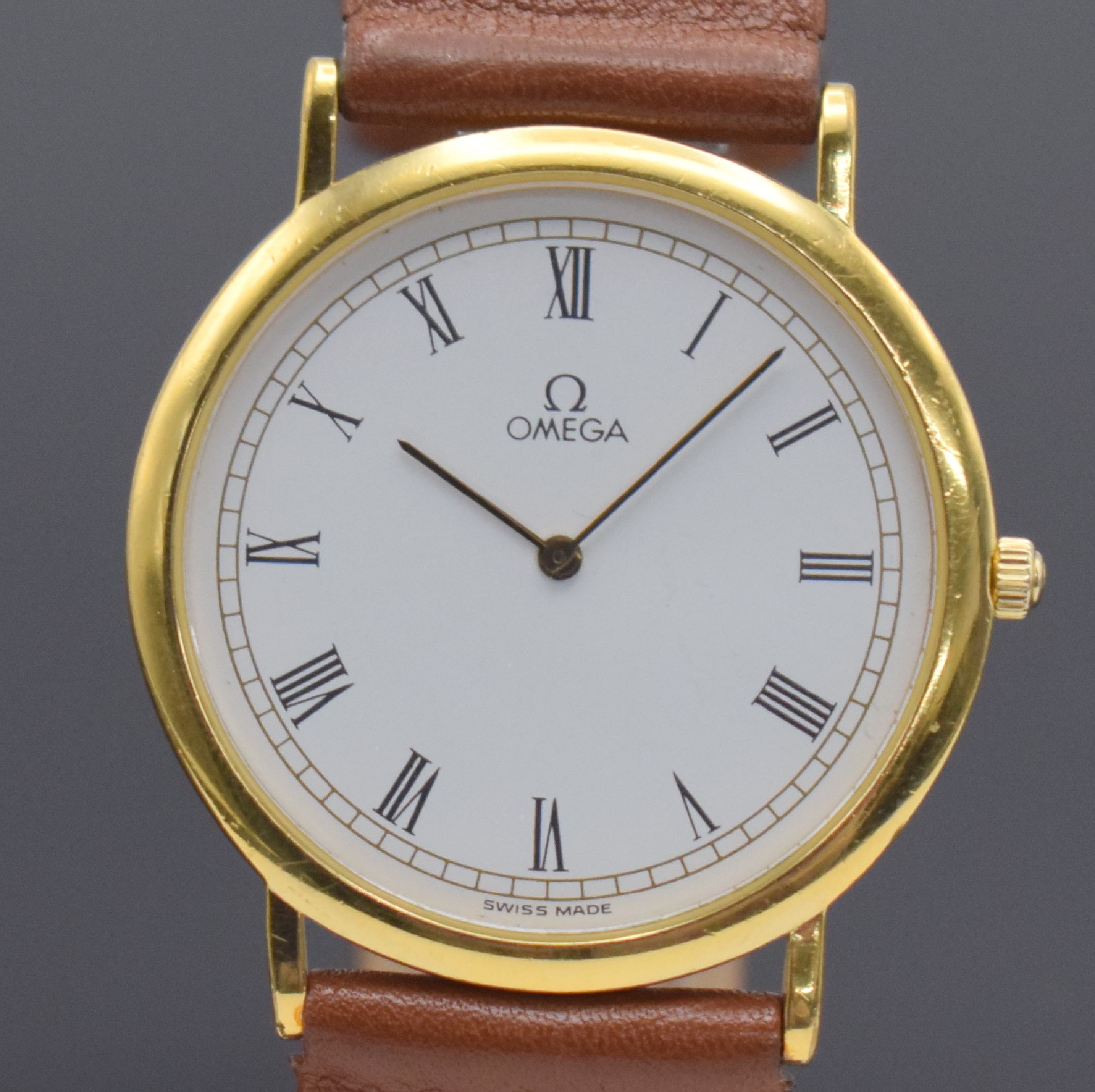Detail a: OMEGA De Ville Armbanduhr, Schweiz um 1990, quarz, Ref. 195 0075.1, verg. Gehäuse, Stahlboden aufgedr., weißes Zifferbl. m. röm. Zahlen, gold. ...