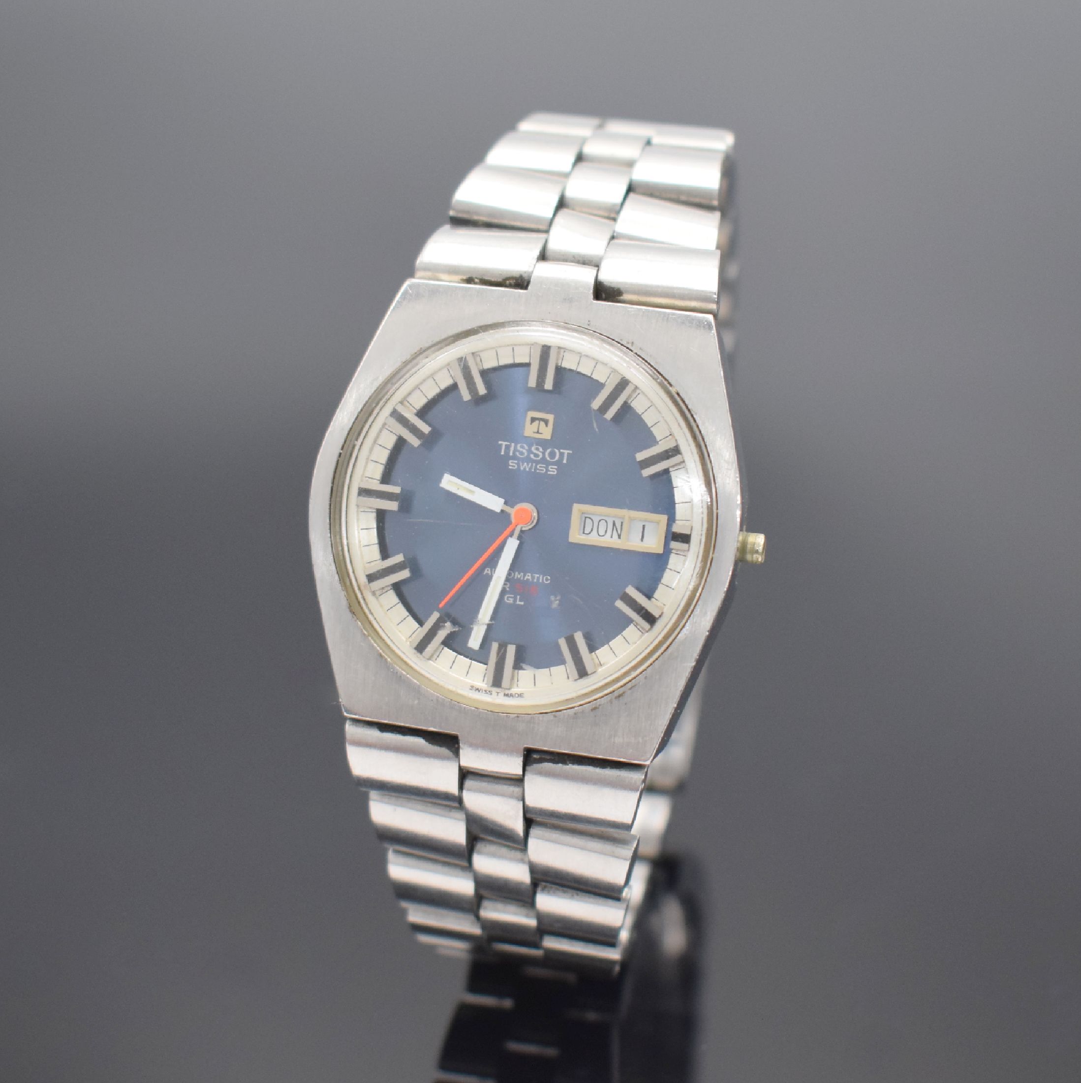TISSOT Herrenarmbanduhr PR 516 GL, Automatik, Schweiz um 1972, Edelstahlgeh. inkl. orig. Gliederband m. Faltschl., Boden verschr., Anz. v. Std., ...