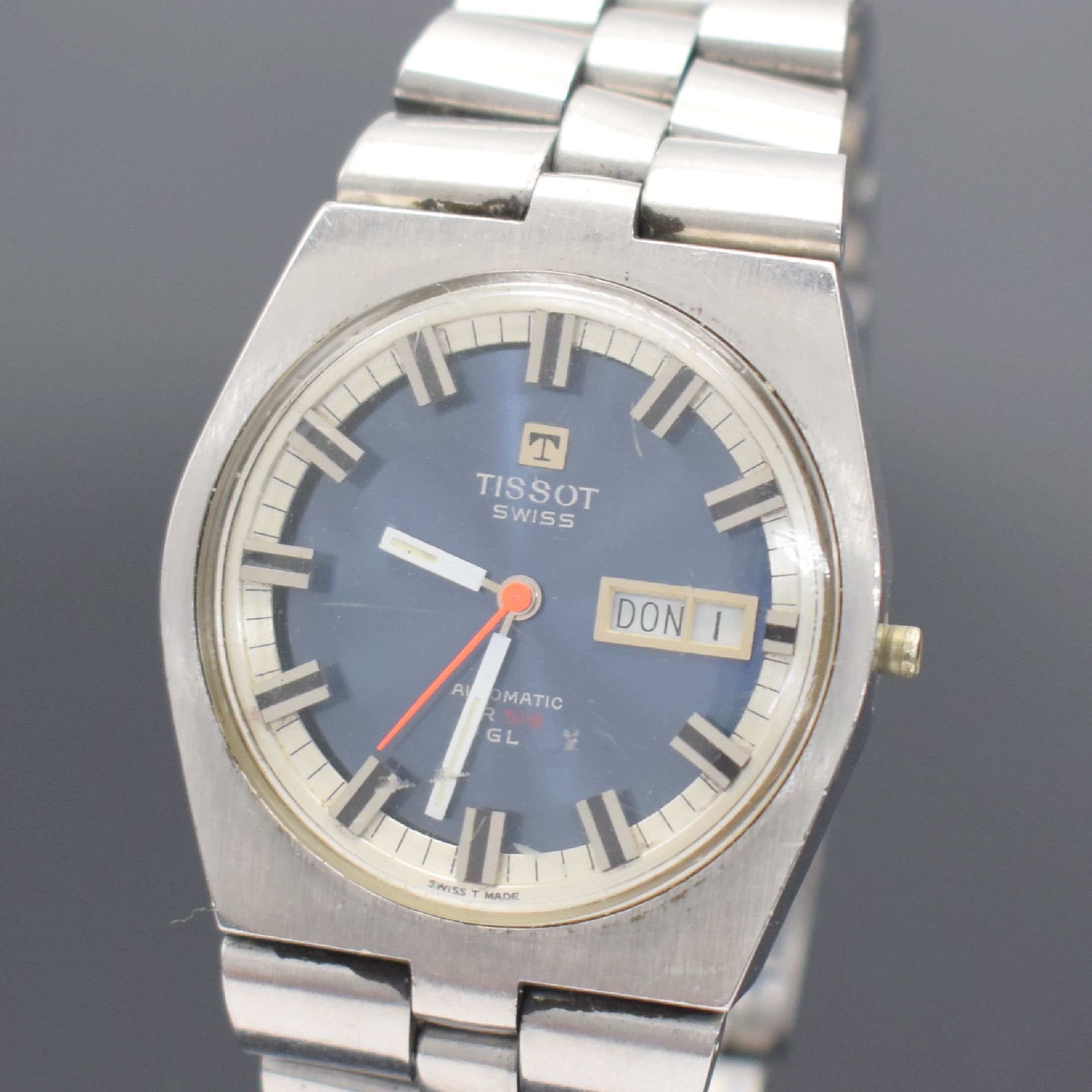 Detail a: TISSOT Herrenarmbanduhr PR 516 GL, Automatik, Schweiz um 1972, Edelstahlgeh. inkl. orig. Gliederband m. Faltschl., Boden verschr., Anz. v. Std., ...