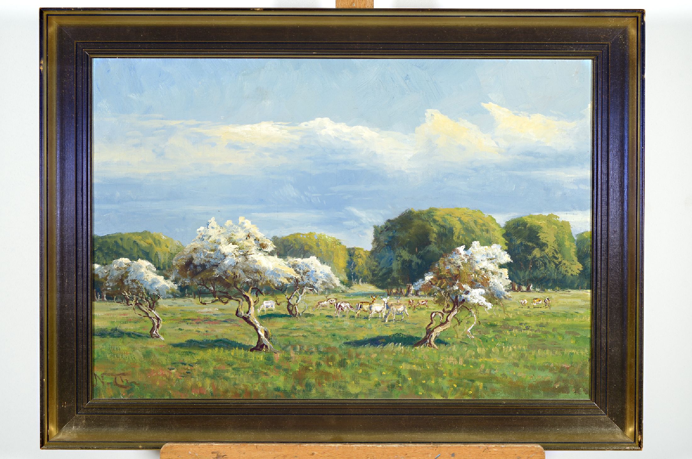 Niels Peter Christiansen, 1873 Eskebjerg-1960, Rehe auf einer Wiese unter blühenden Bäumen, Öl/Lwd, links unten sign., ca. 46x68cm, R.