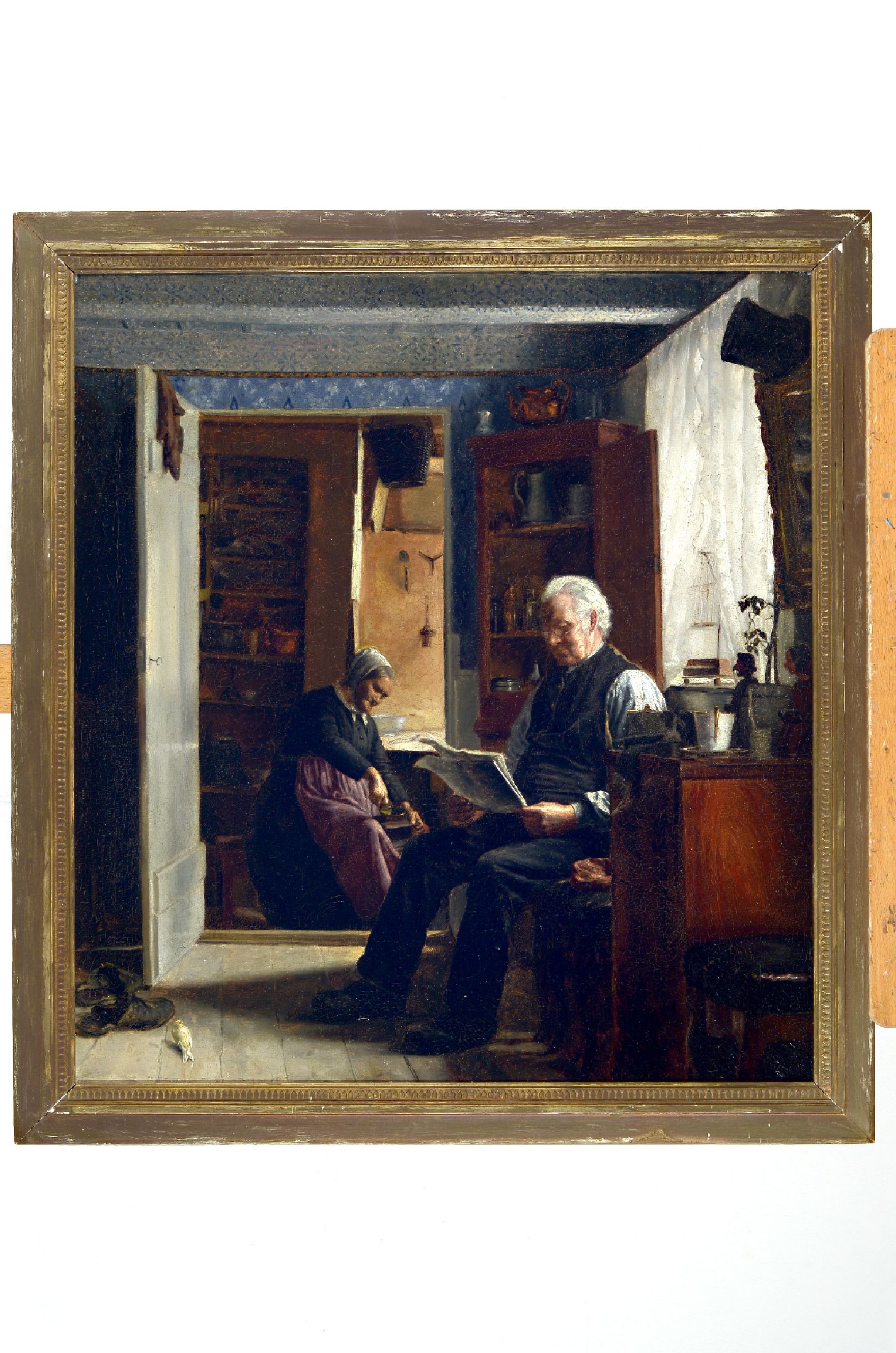 Zuschreibung: Cilius Andersen, 1865 Odense -1913 Kopenhagen, Ehepaar in der Stube, er liest Zeitung, sie mahlt Kaffee, Öl/Lwd, unsigniert, ca. ...