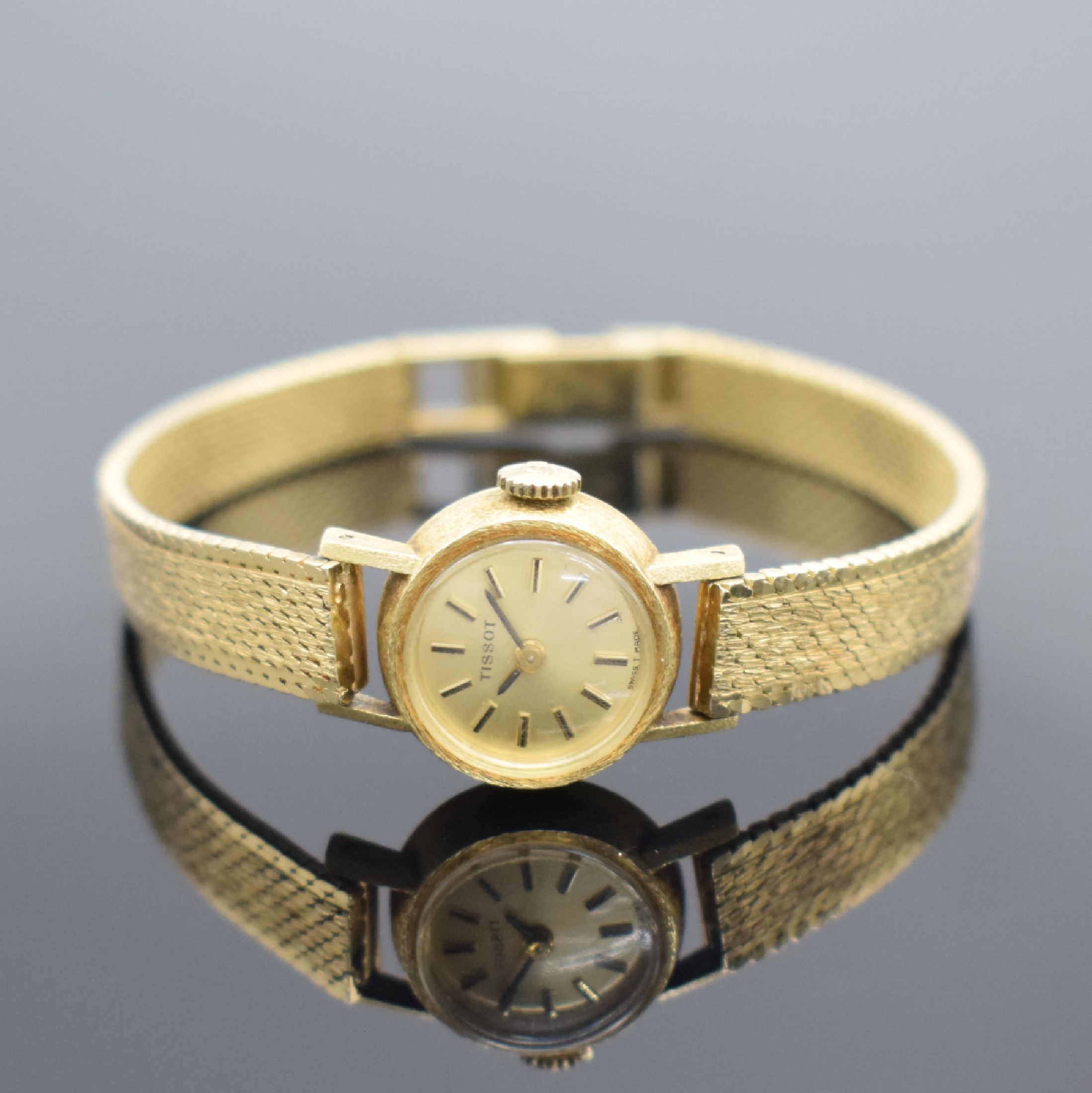 TISSOT Damenarmbanduhr in GG 585/000, Handaufzug, Schweiz um 1964, neutr. GG 585/000 Band, Boden aufgedr., verg. Zifferbl. m. aufgel. Indizes, ...