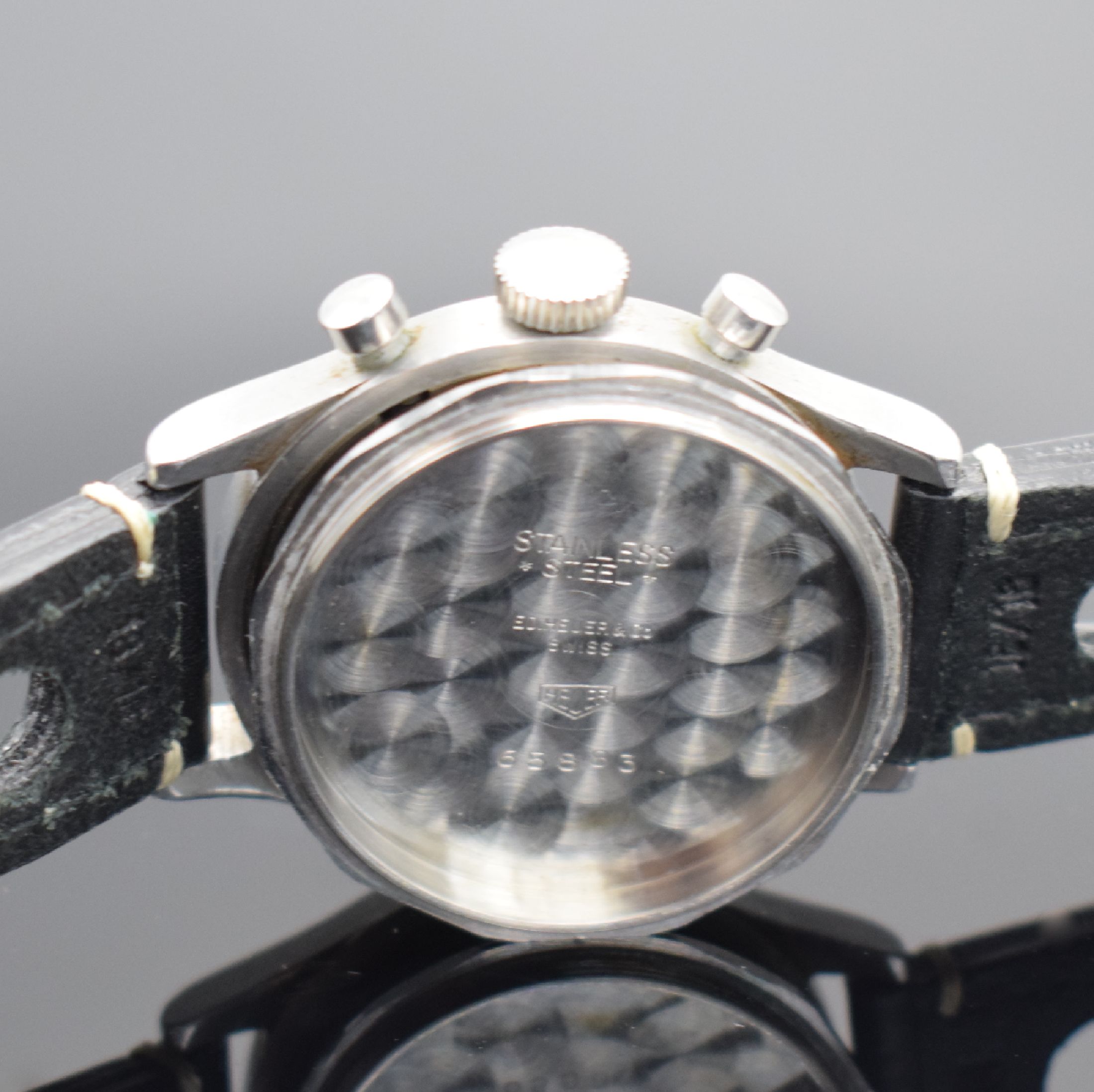 Detail e: HEUER seltener Schaltradchronograph mit Kaliber Valjoux 23 in Edelstahl, Schweiz um 1950, Handaufzug, sign. Boden geschr., schwarzes orig. ...
