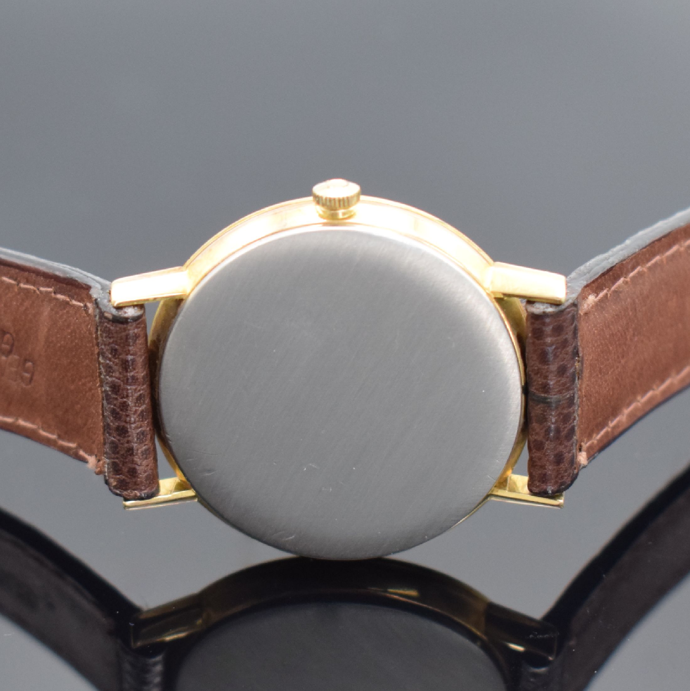 Detail d: OMEGA Herrenarmbanduhr Referenz 131.019, Handaufzug, Schweiz um 1968, verg. Metallgeh., Edelstahlboden aufgedr., Lederband mit Omega Stiftschl., ...
