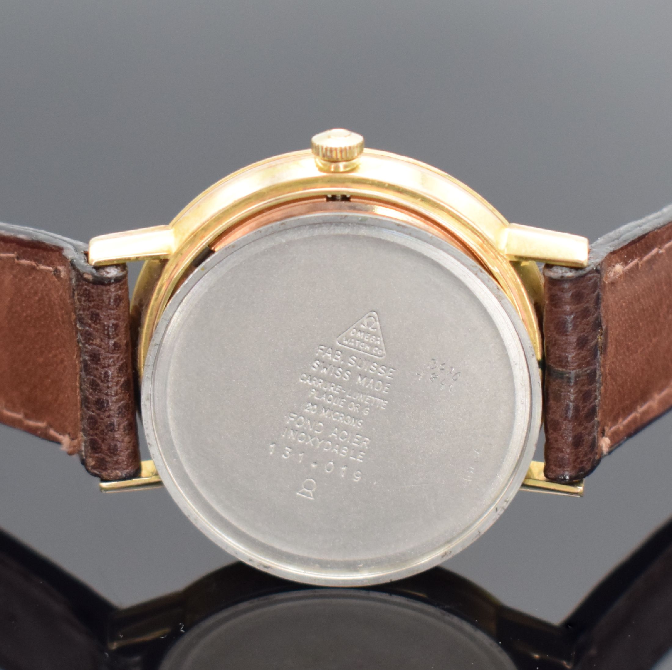 Detail f: OMEGA Herrenarmbanduhr Referenz 131.019, Handaufzug, Schweiz um 1968, verg. Metallgeh., Edelstahlboden aufgedr., Lederband mit Omega Stiftschl., ...